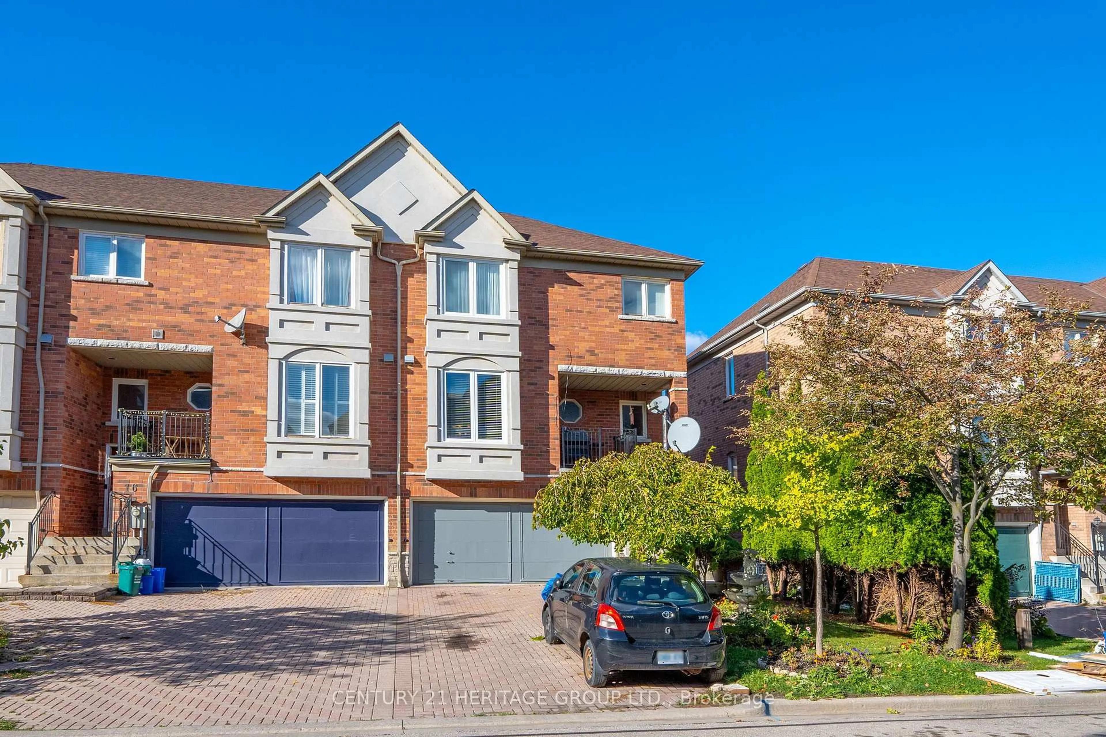Home with brick exterior material, street for 18 Orchid Rd, Markham Ontario L3T 7T6