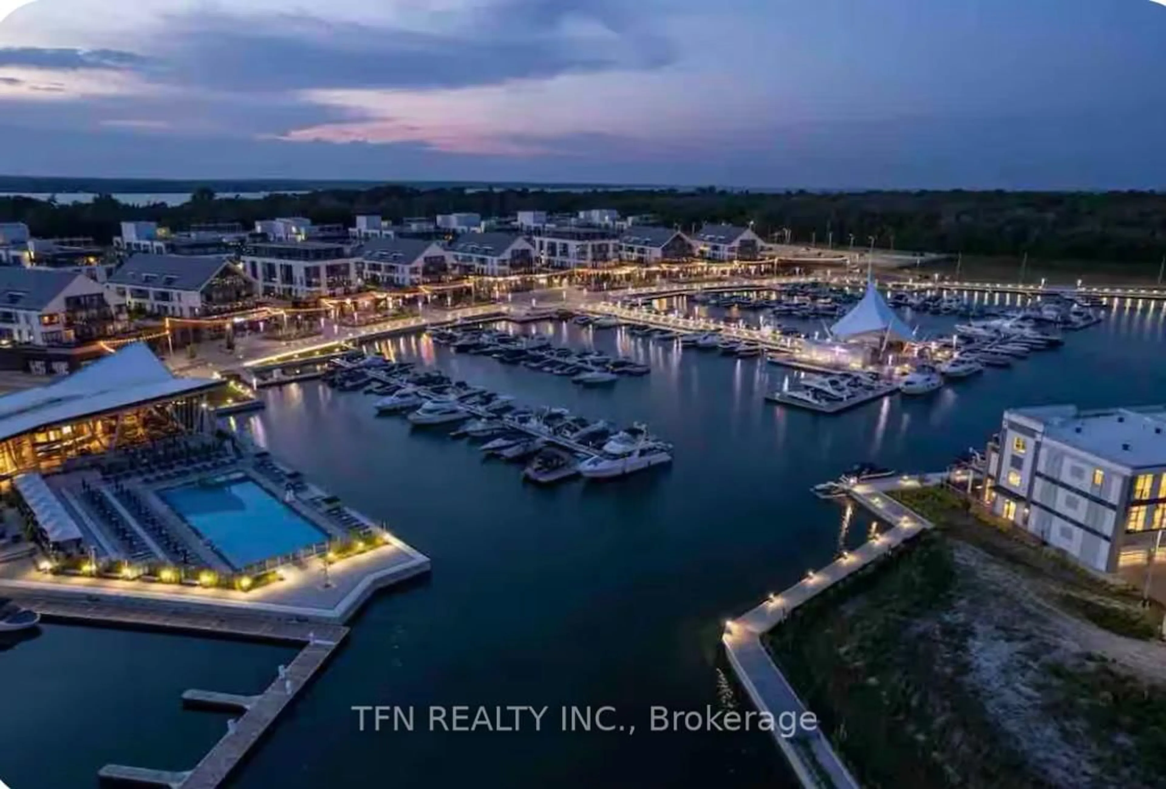 A pic from outside/outdoor area/front of a property/back of a property/a pic from drone, water/lake/river/ocean view for 415 Sea Ray Ave #106, Innisfil Ontario L9S 0R5