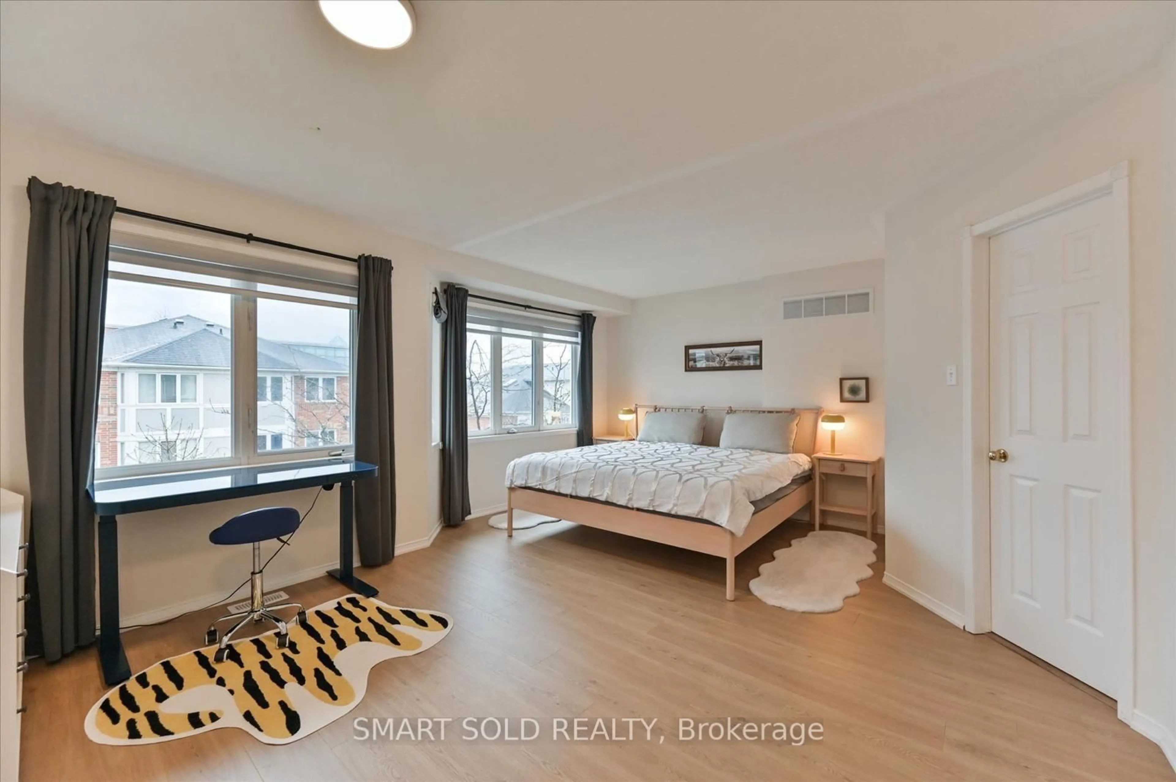 Bedroom with bed, wood/laminate floor for 18 Clark Ave #152, Vaughan Ontario L4J 8H1