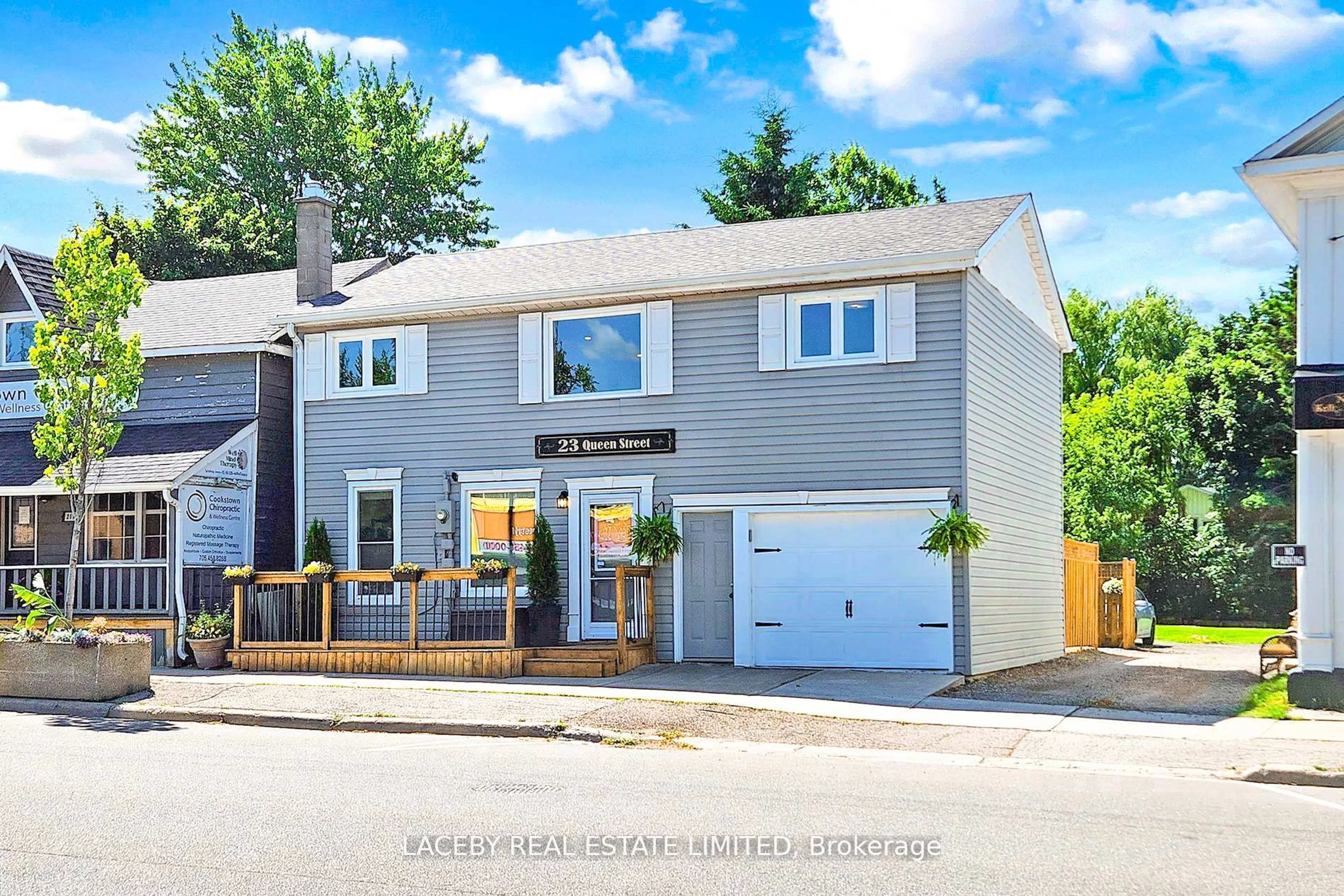 Home with vinyl exterior material, street for 23 Queen St, Innisfil Ontario L0L 1L0