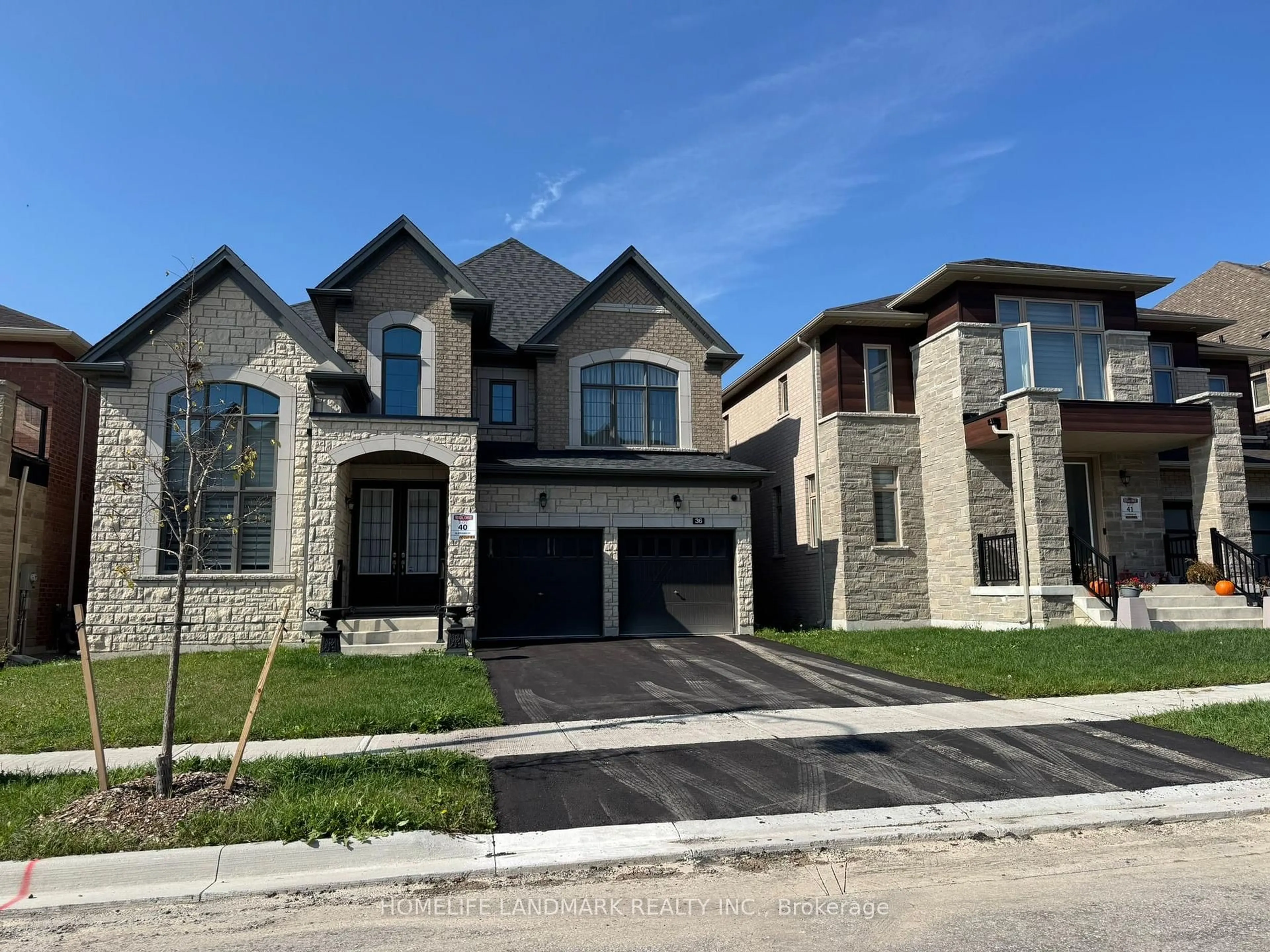 Home with brick exterior material, street for 36 Upbound Crt, East Gwillimbury Ontario L9N 0W5