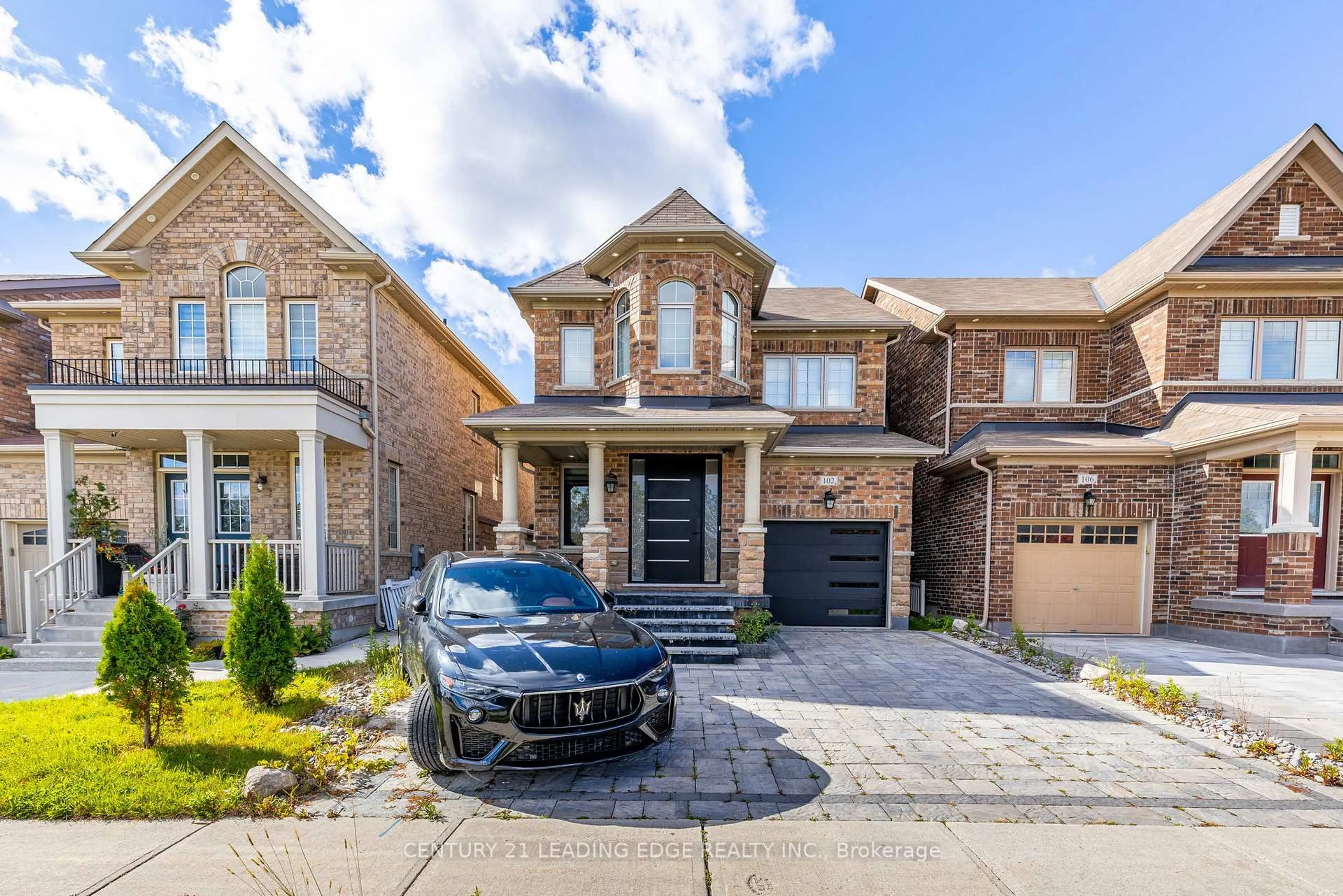 Home with brick exterior material, street for 102 MACTIER Dr, Vaughan Ontario L4H 4T9