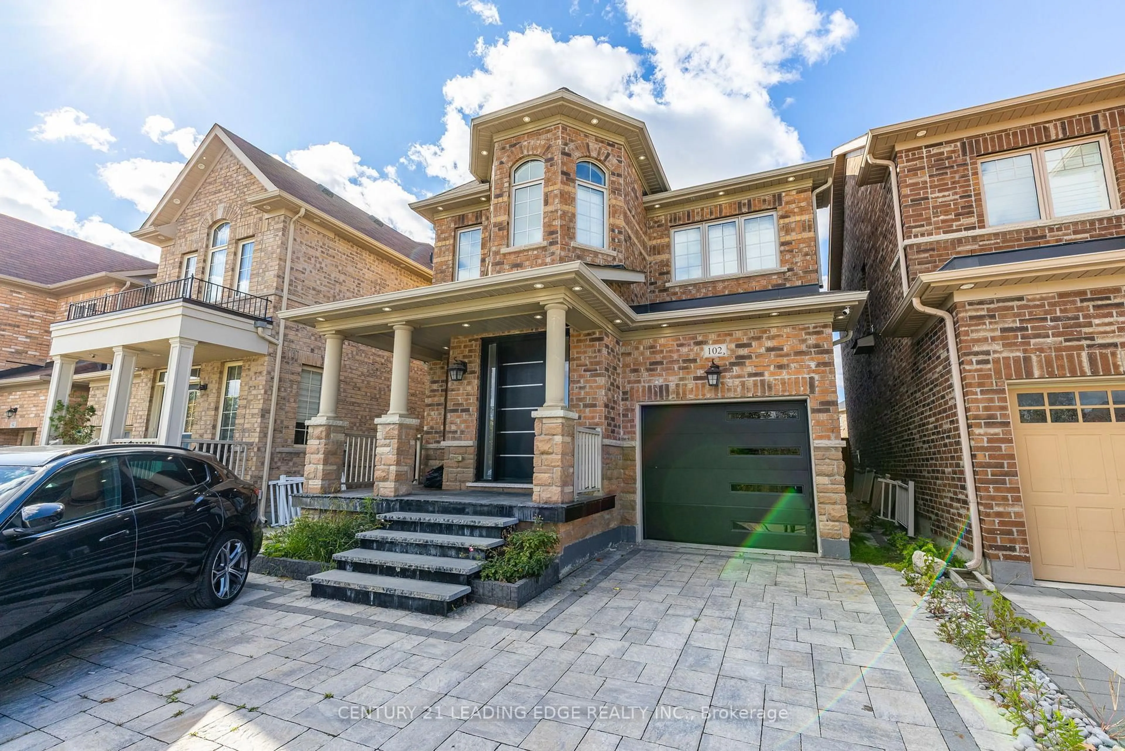 Home with brick exterior material, street for 102 MACTIER Dr, Vaughan Ontario L4H 4T9