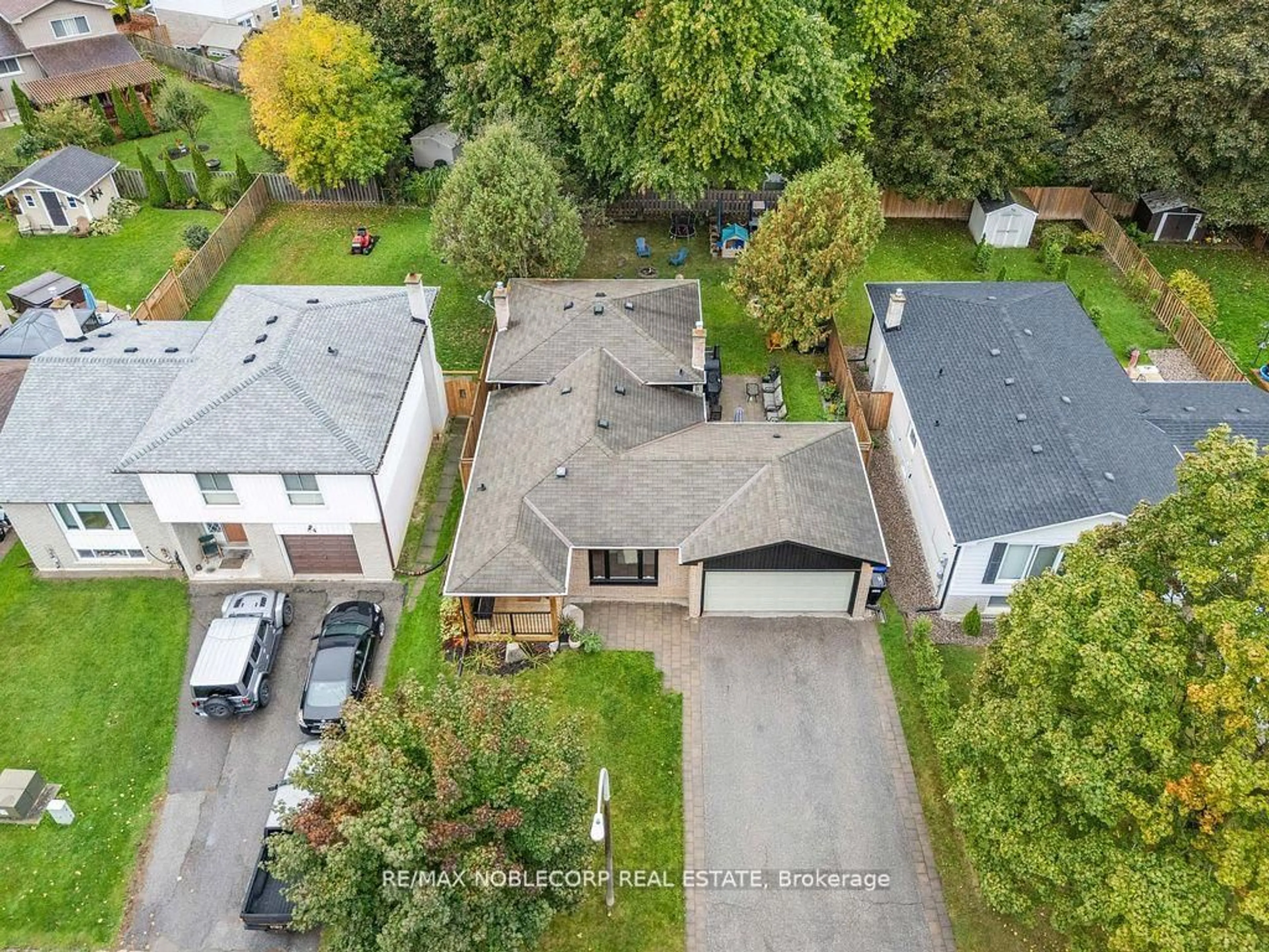 A pic from outside/outdoor area/front of a property/back of a property/a pic from drone, street for 42 Mitchell Ave, New Tecumseth Ontario L9R 1C2