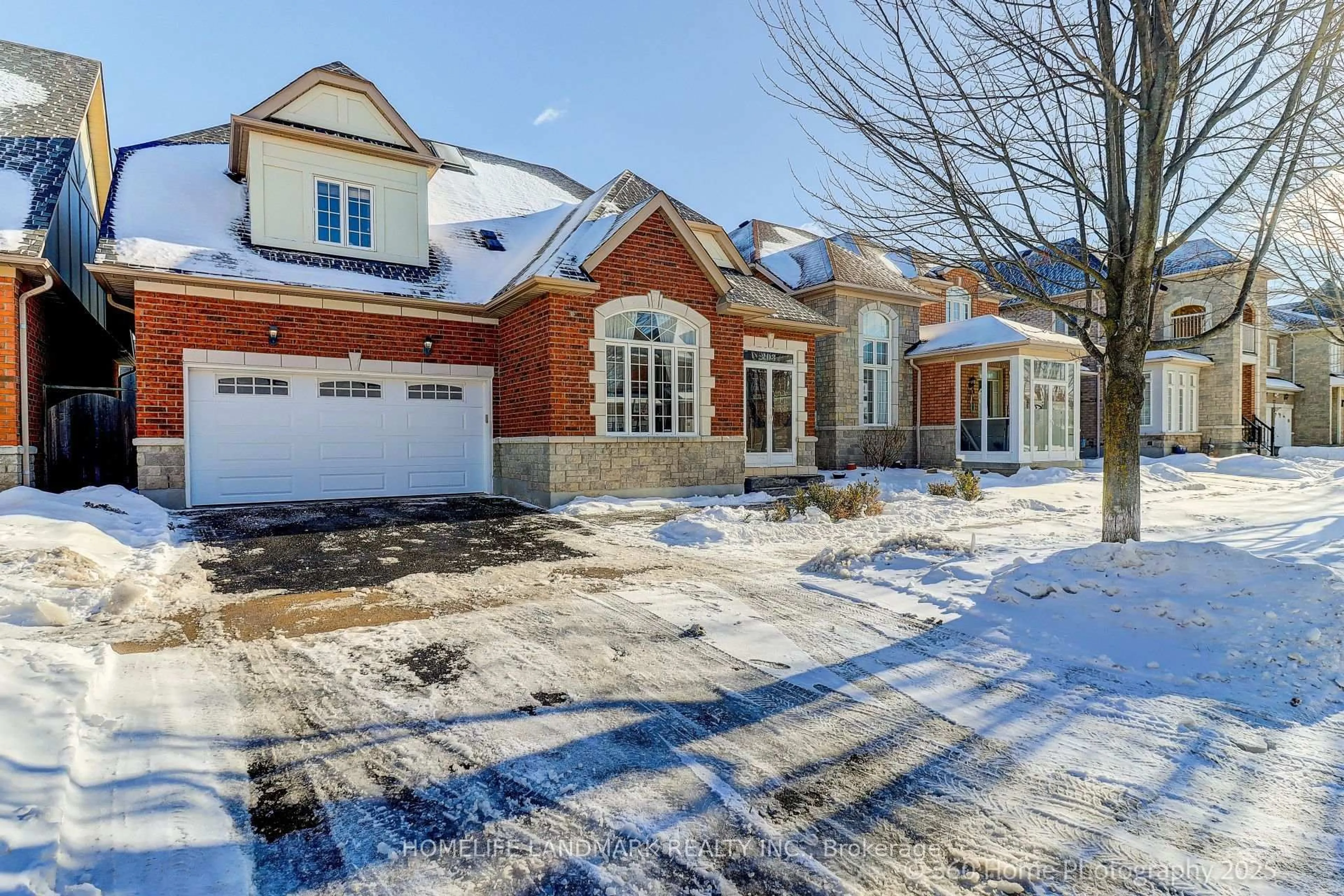 Home with brick exterior material, street for 203 Everett St, Markham Ontario L6E 1H2