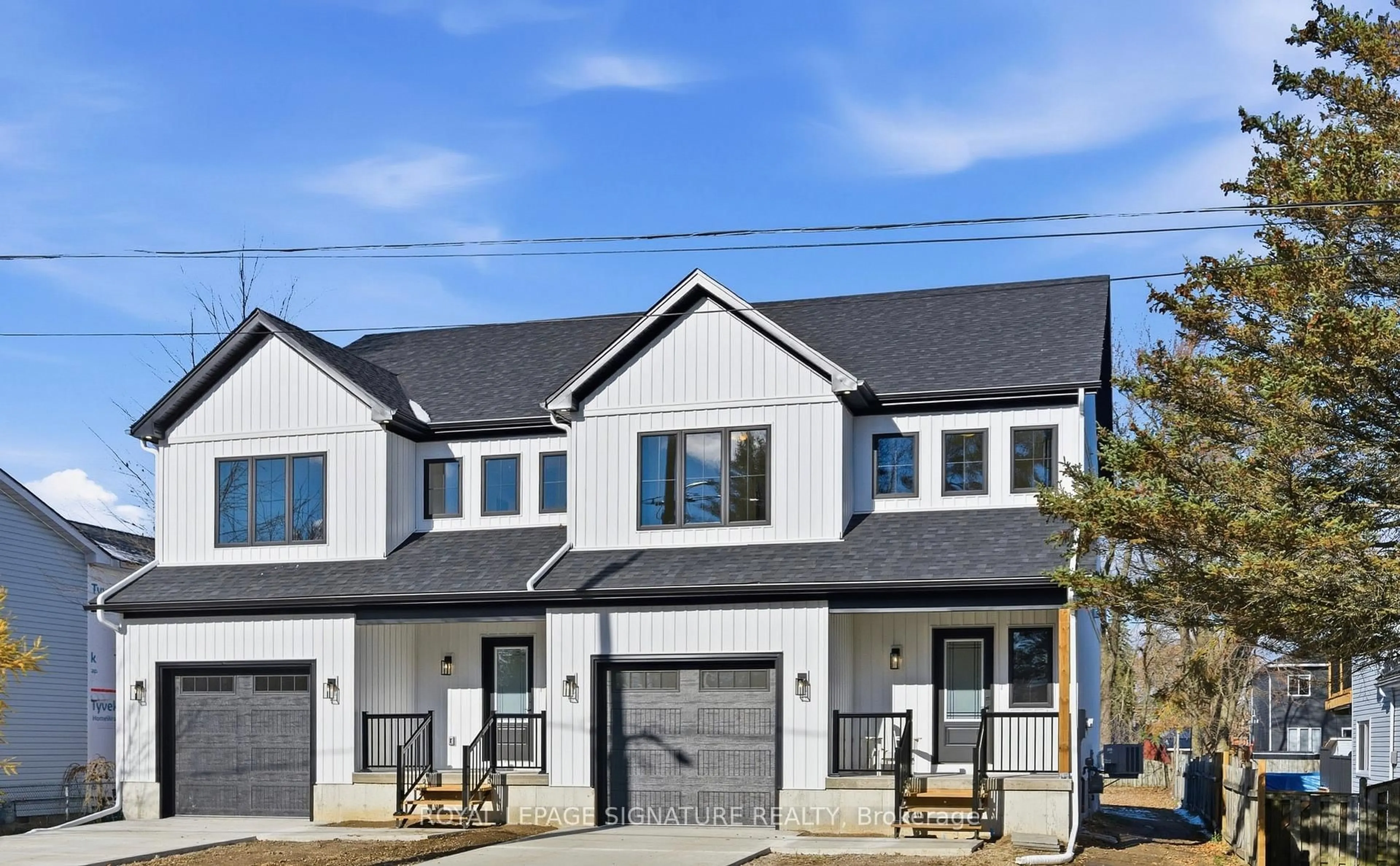 Home with vinyl exterior material, street for 125 Sydenham St #B, Essa Ontario L0M 1B0