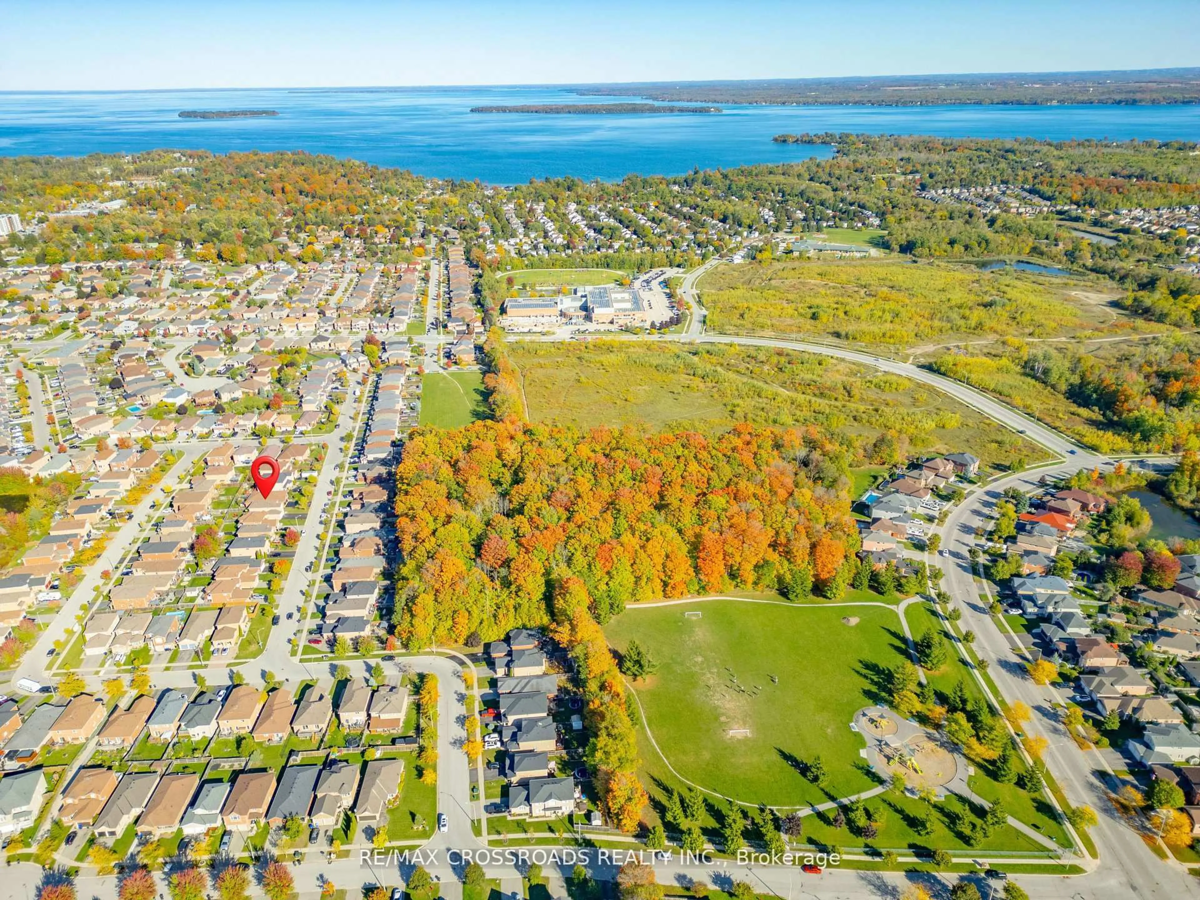 A pic from outside/outdoor area/front of a property/back of a property/a pic from drone, water/lake/river/ocean view for 1220 Laurand St, Innisfil Ontario L9S 0E6