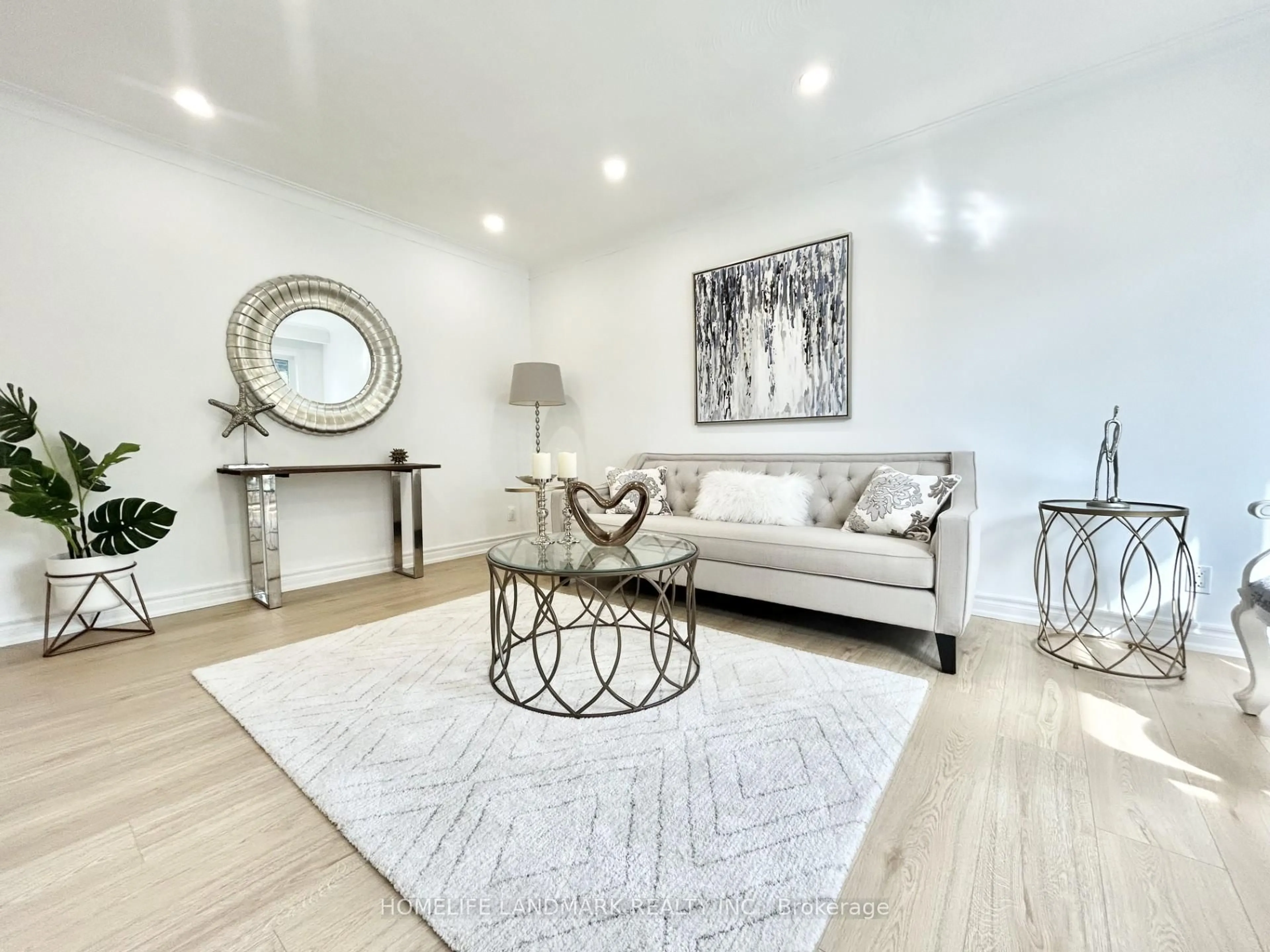 Living room with furniture, wood/laminate floor for 323 Elmwood Ave, Richmond Hill Ontario L4C 1L7