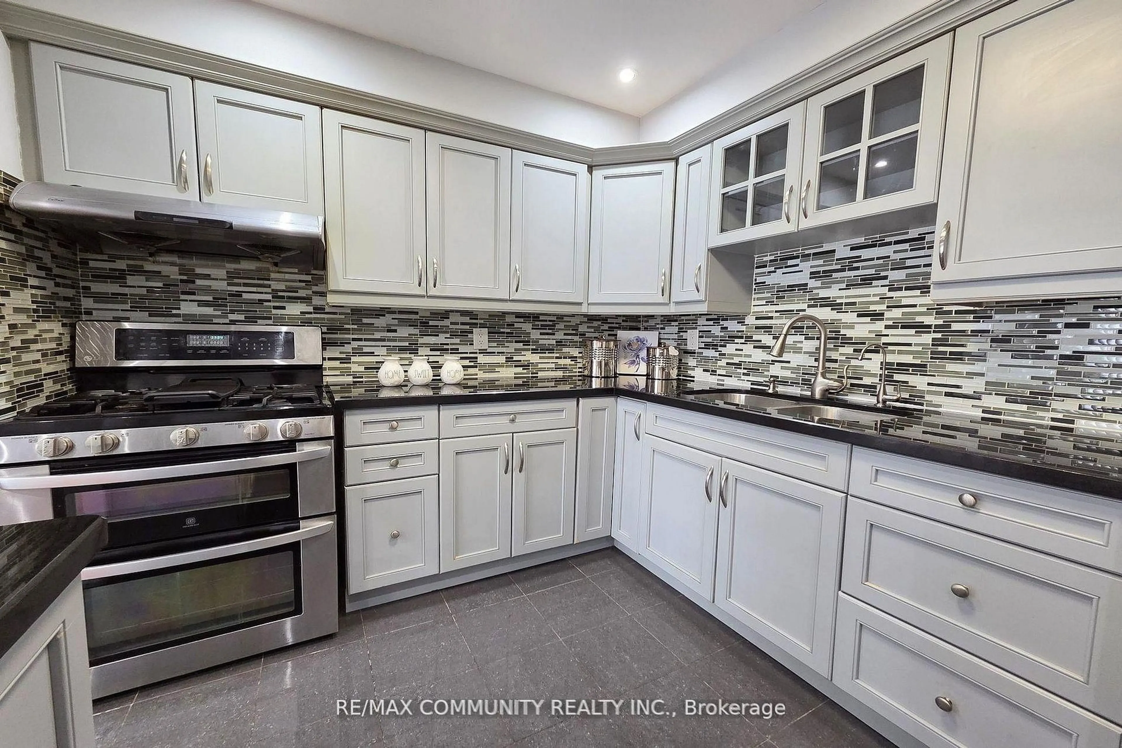 Contemporary kitchen, ceramic/tile floor for 31 Stather Cres, Markham Ontario L3S 1C9