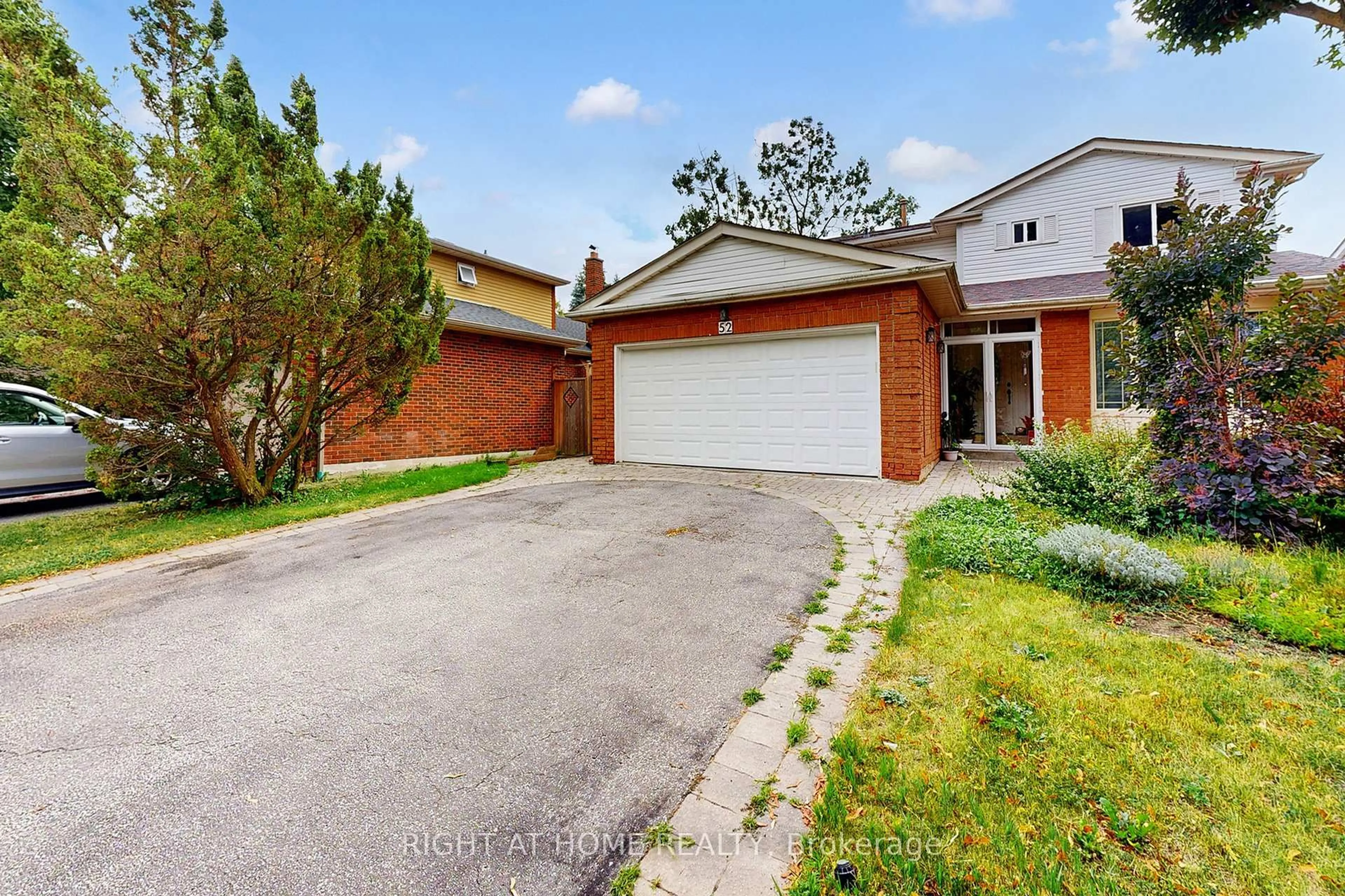 Home with brick exterior material, street for 52 Breckonwood Cres, Markham Ontario L3T 5E8