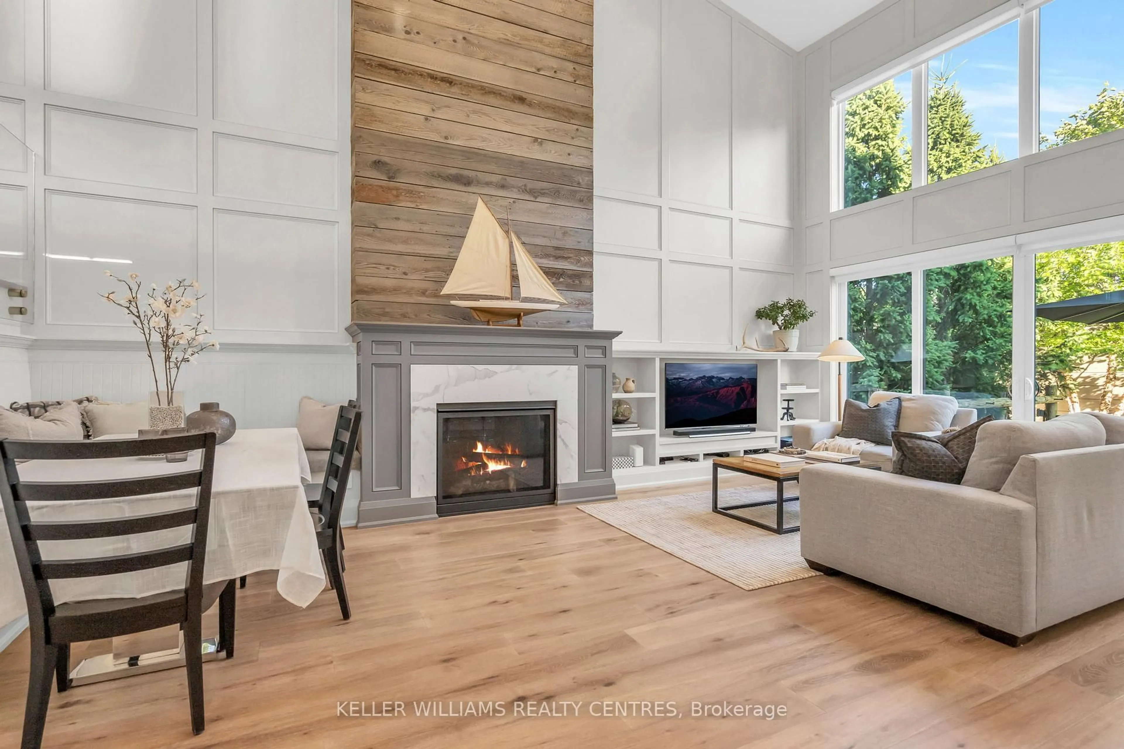 Living room with furniture, wood/laminate floor for 23 Mosley St, Aurora Ontario L4G 1G7