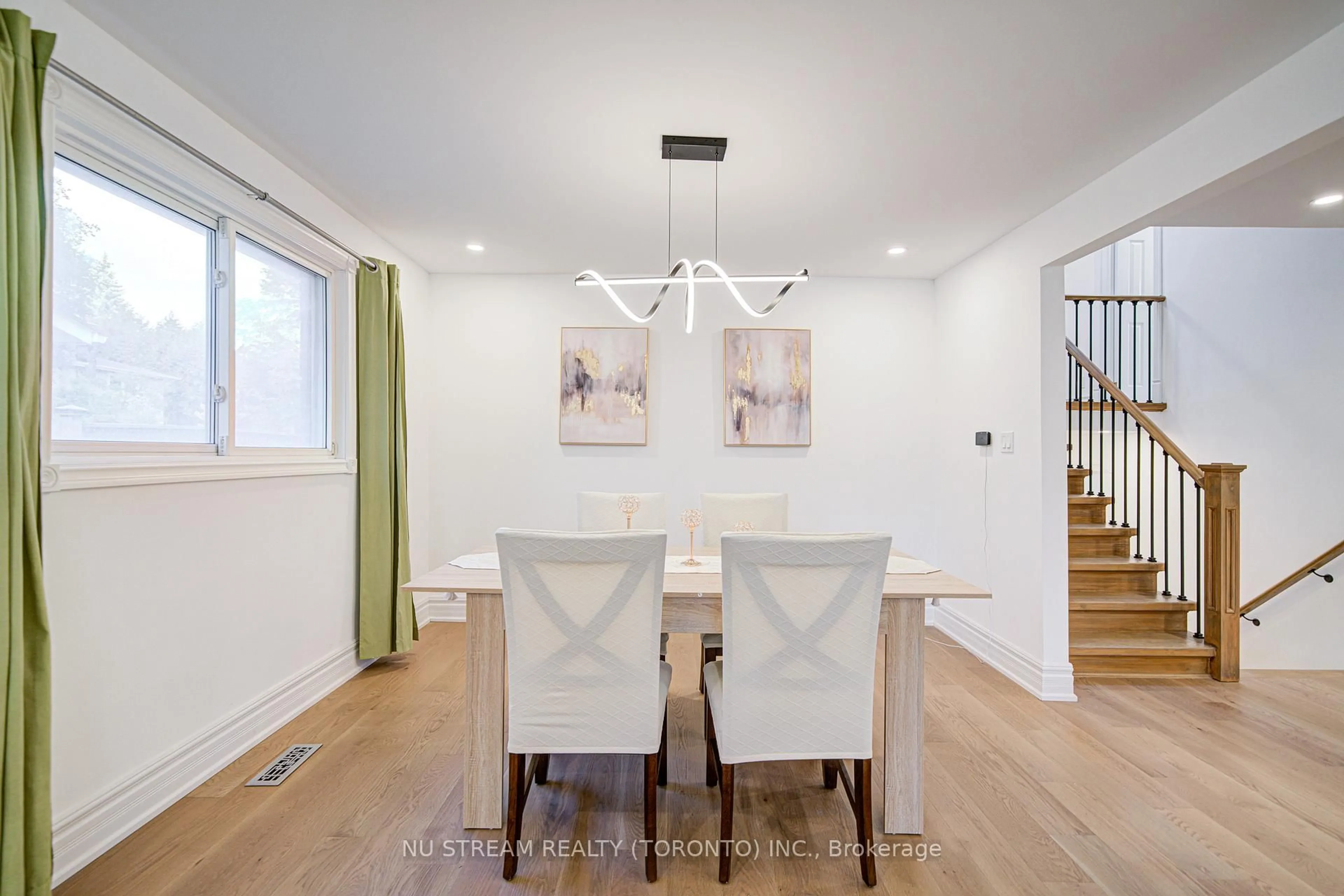 Dining room, wood/laminate floor for 8 Hemingway Cres, Markham Ontario L3R 2A4