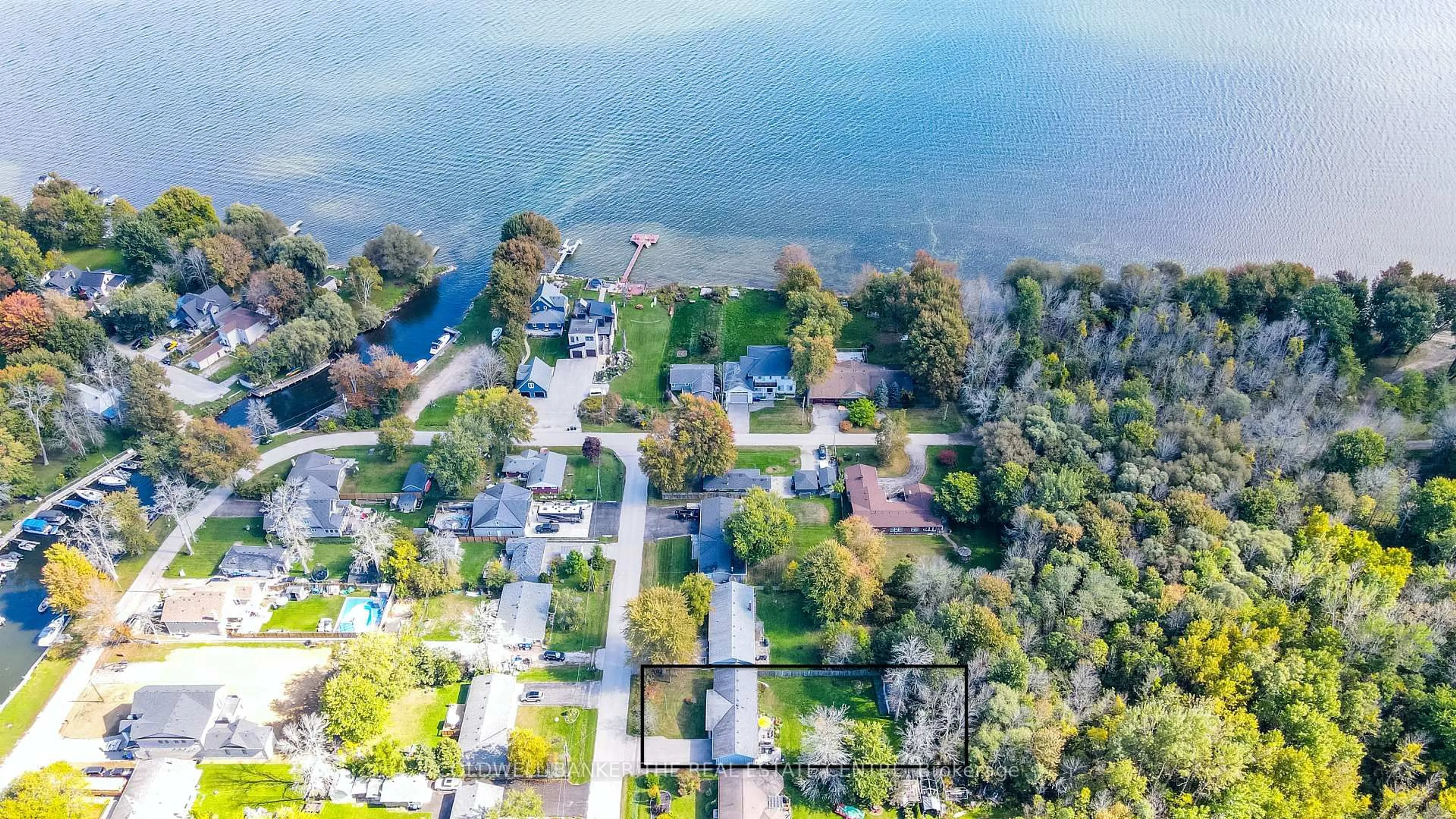 A pic from outside/outdoor area/front of a property/back of a property/a pic from drone, water/lake/river/ocean view for 1151 Birch Rd, Innisfil Ontario L0L 1R0