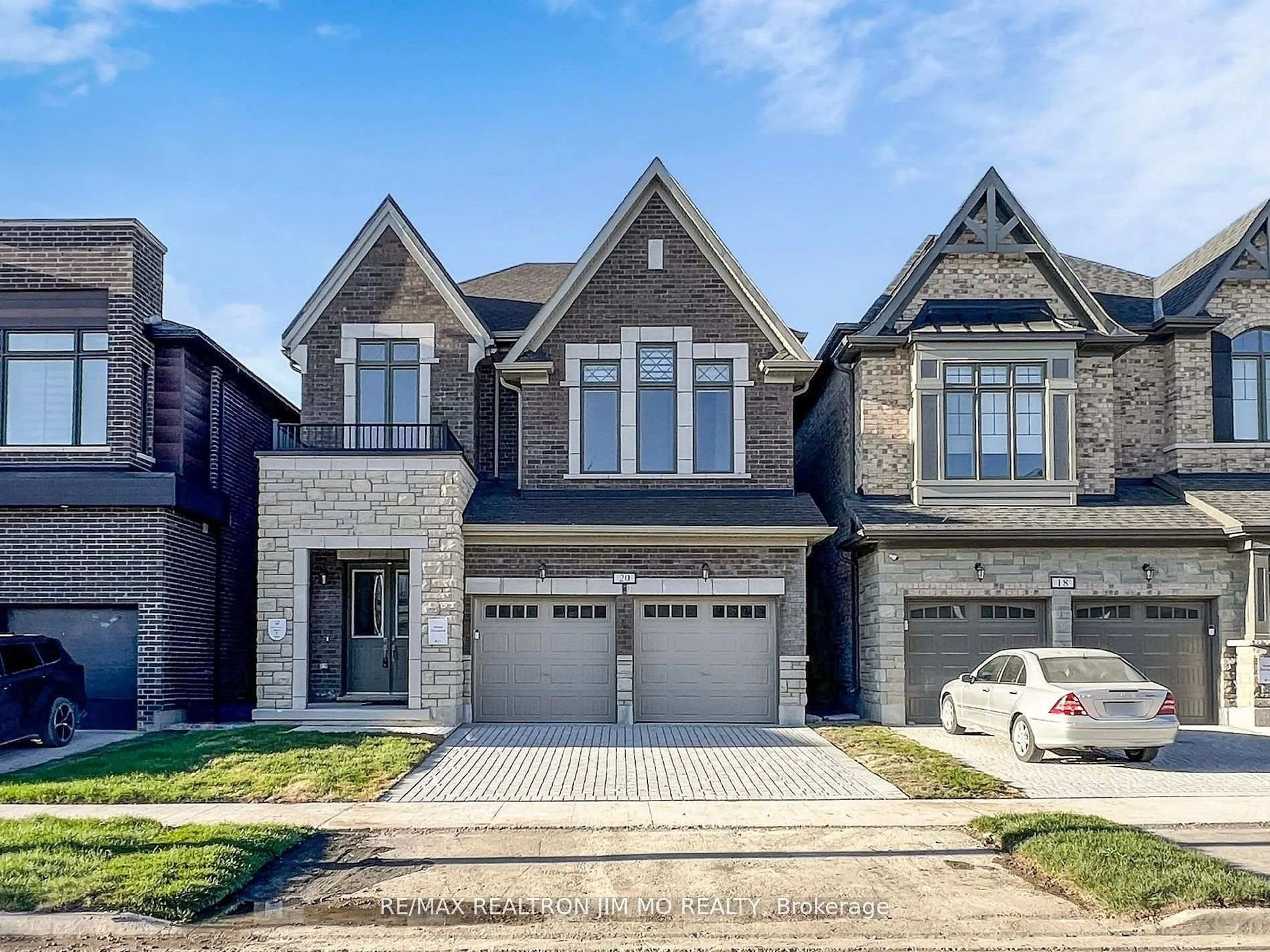 Home with brick exterior material, street for 20 Nanhai Ave, Markham Ontario L6C 3M9