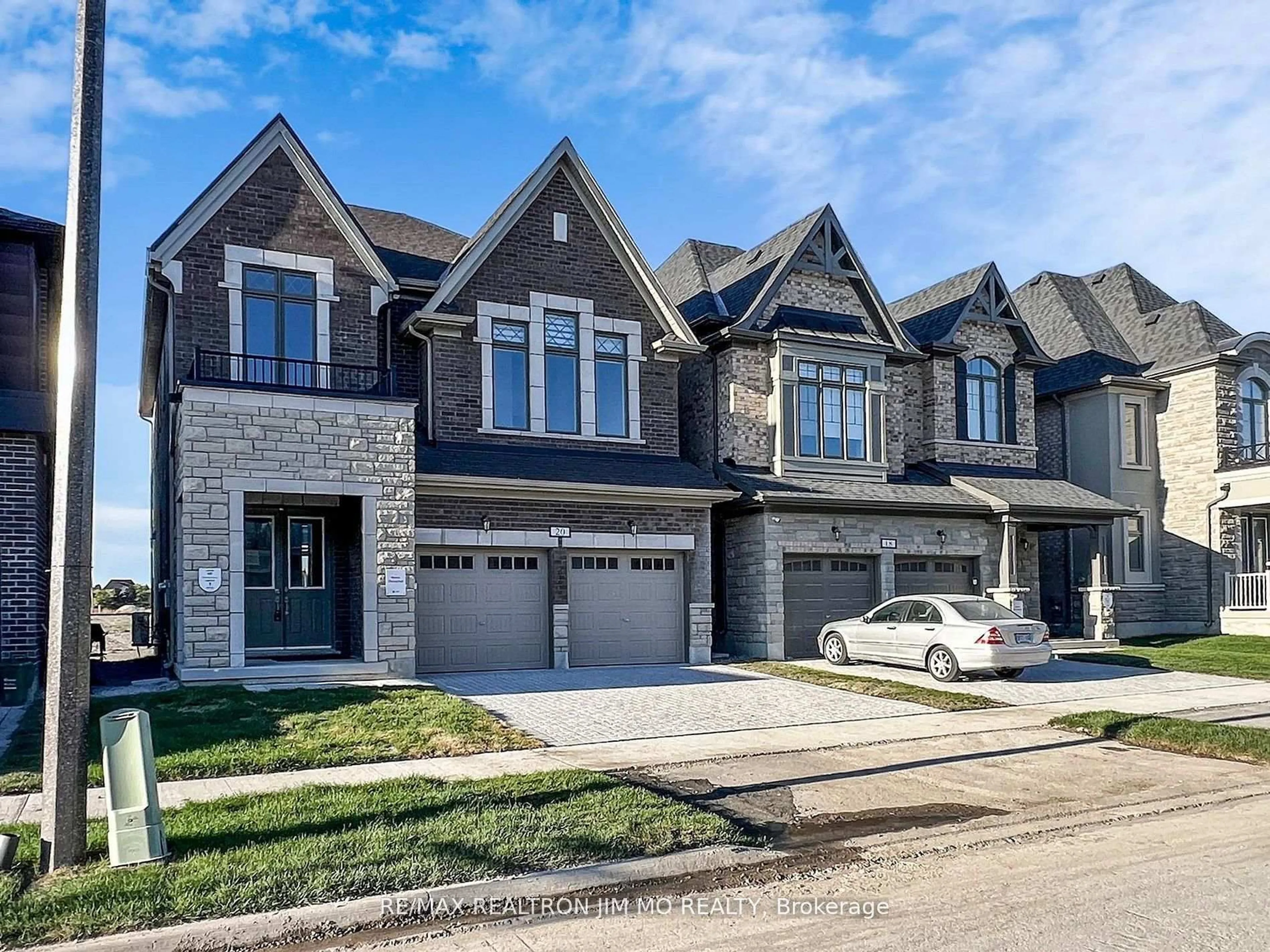 Home with brick exterior material, street for 20 Nanhai Ave, Markham Ontario L6C 3M9