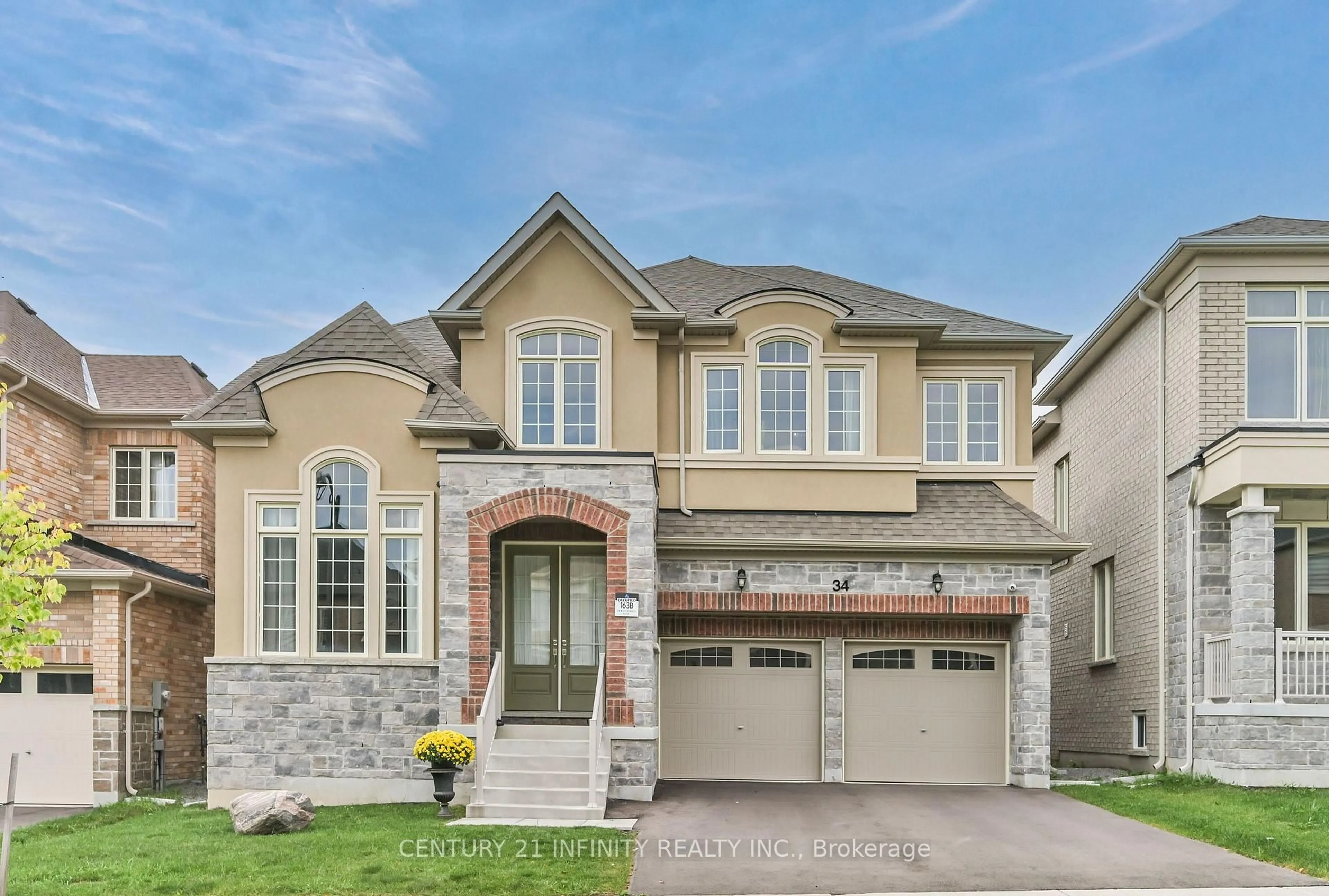 Home with brick exterior material, street for 34 Watershed Gate, East Gwillimbury Ontario L9N 0Y6