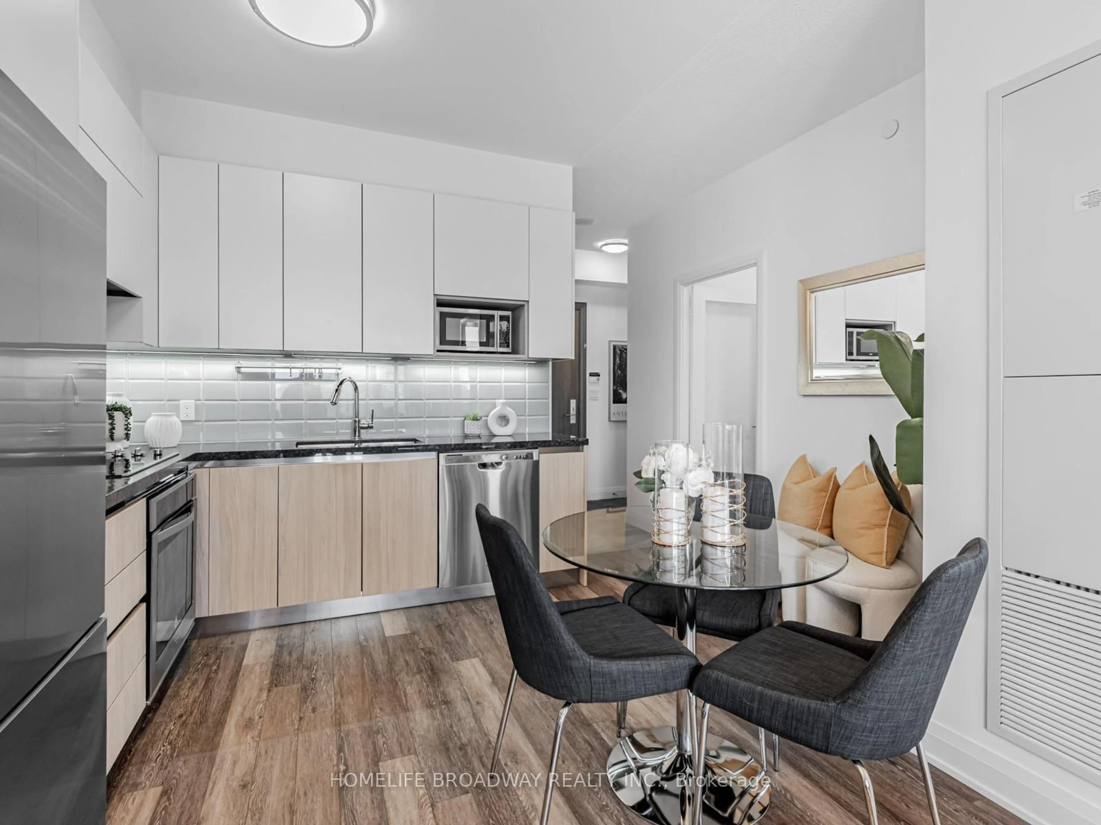 Open concept kitchen, wood/laminate floor for 15 Water Walk Dr #720, Markham Ontario L6G 0G2