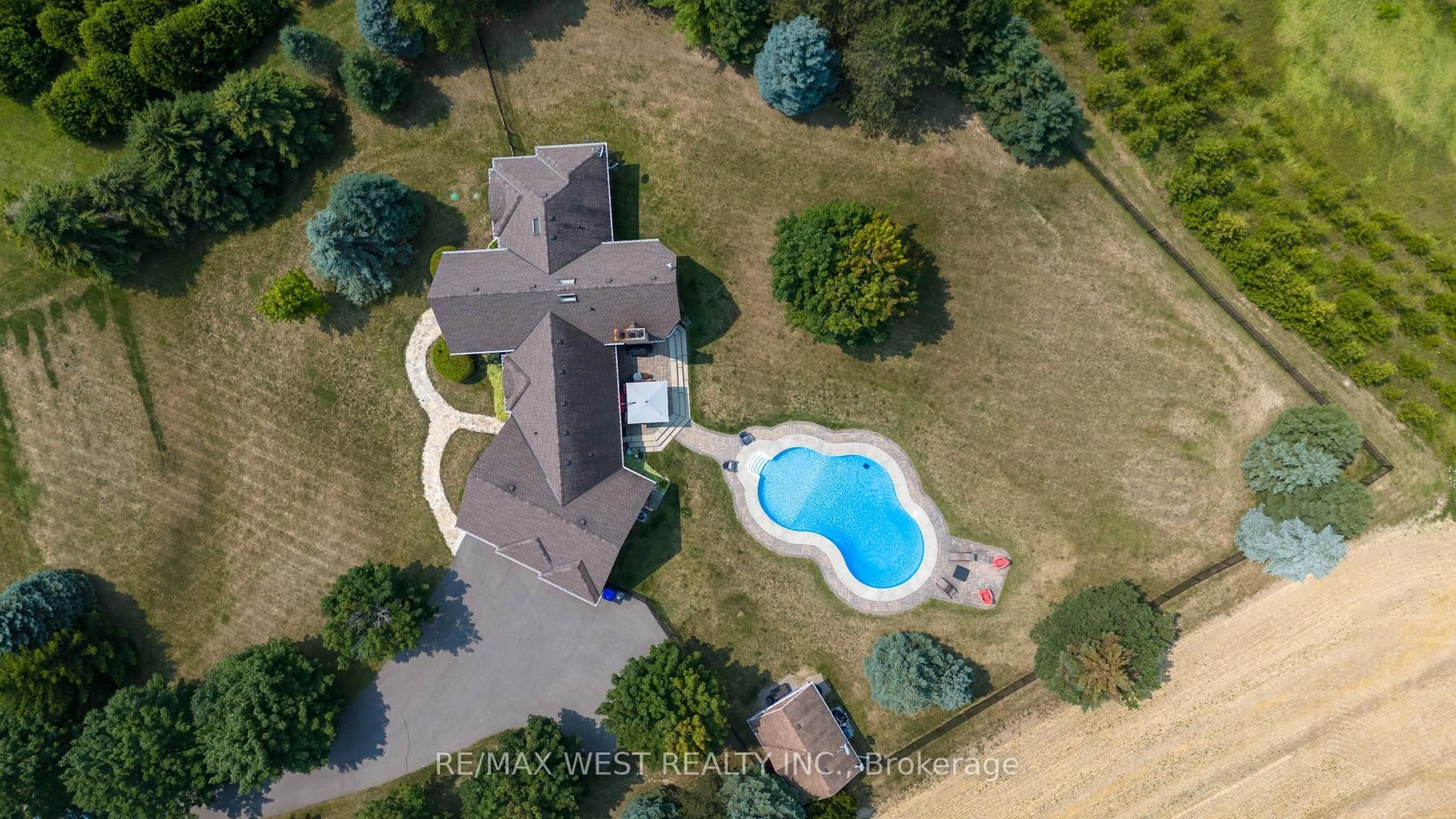 A pic from outside/outdoor area/front of a property/back of a property/a pic from drone, water/lake/river/ocean view for 7636 County 1, Adjala-Tosorontio Ontario L0G 1W0