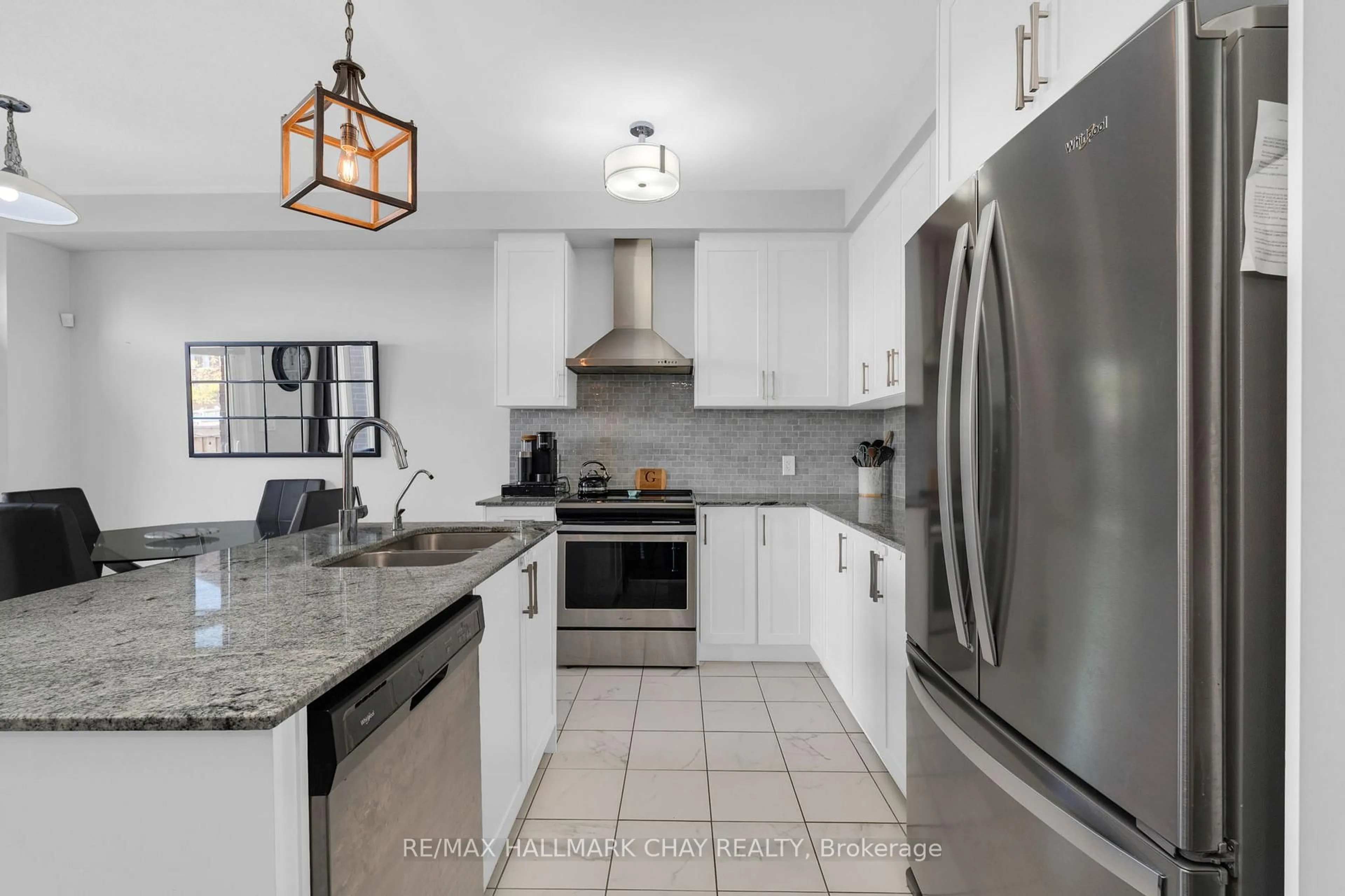Open concept kitchen, ceramic/tile floor for 46 Clifford Cres, New Tecumseth Ontario L0G 1W0