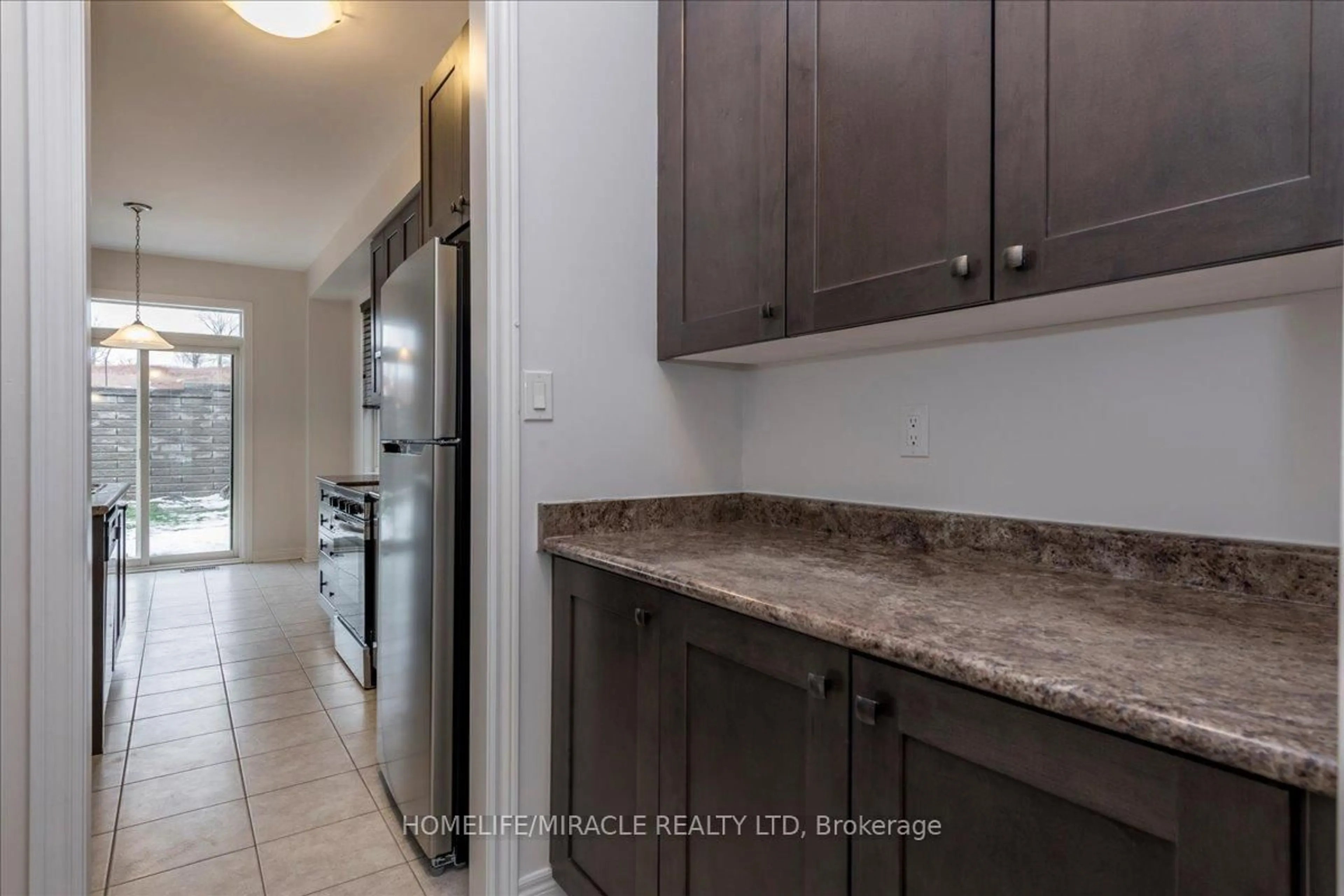Standard kitchen, ceramic/tile floor for 73 Sutcliffe Way, New Tecumseth Ontario L9R 0N8