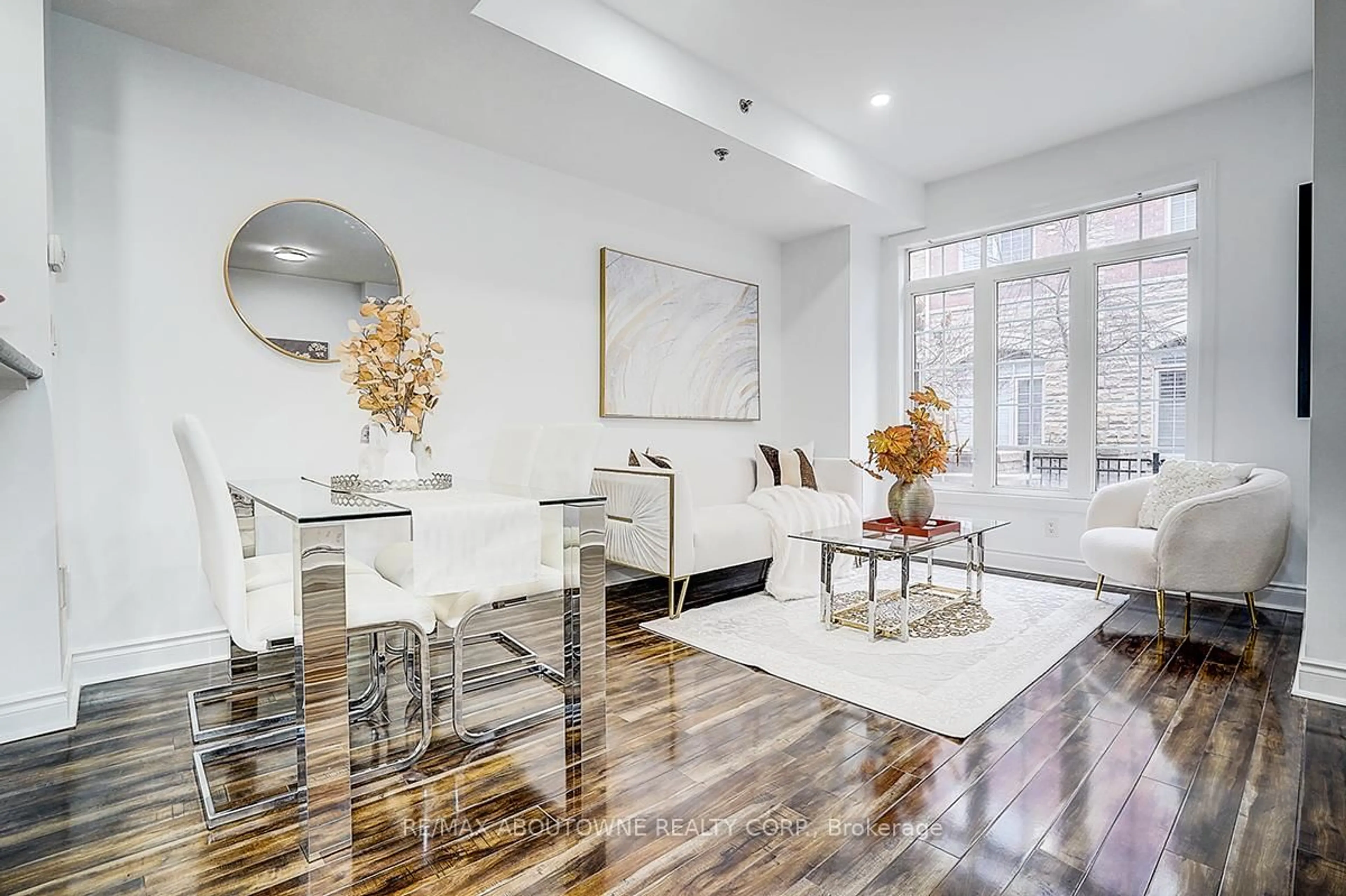 Living room with furniture, wood/laminate floor for 8 Brighton Pl #50, Vaughan Ontario L4J 0E3