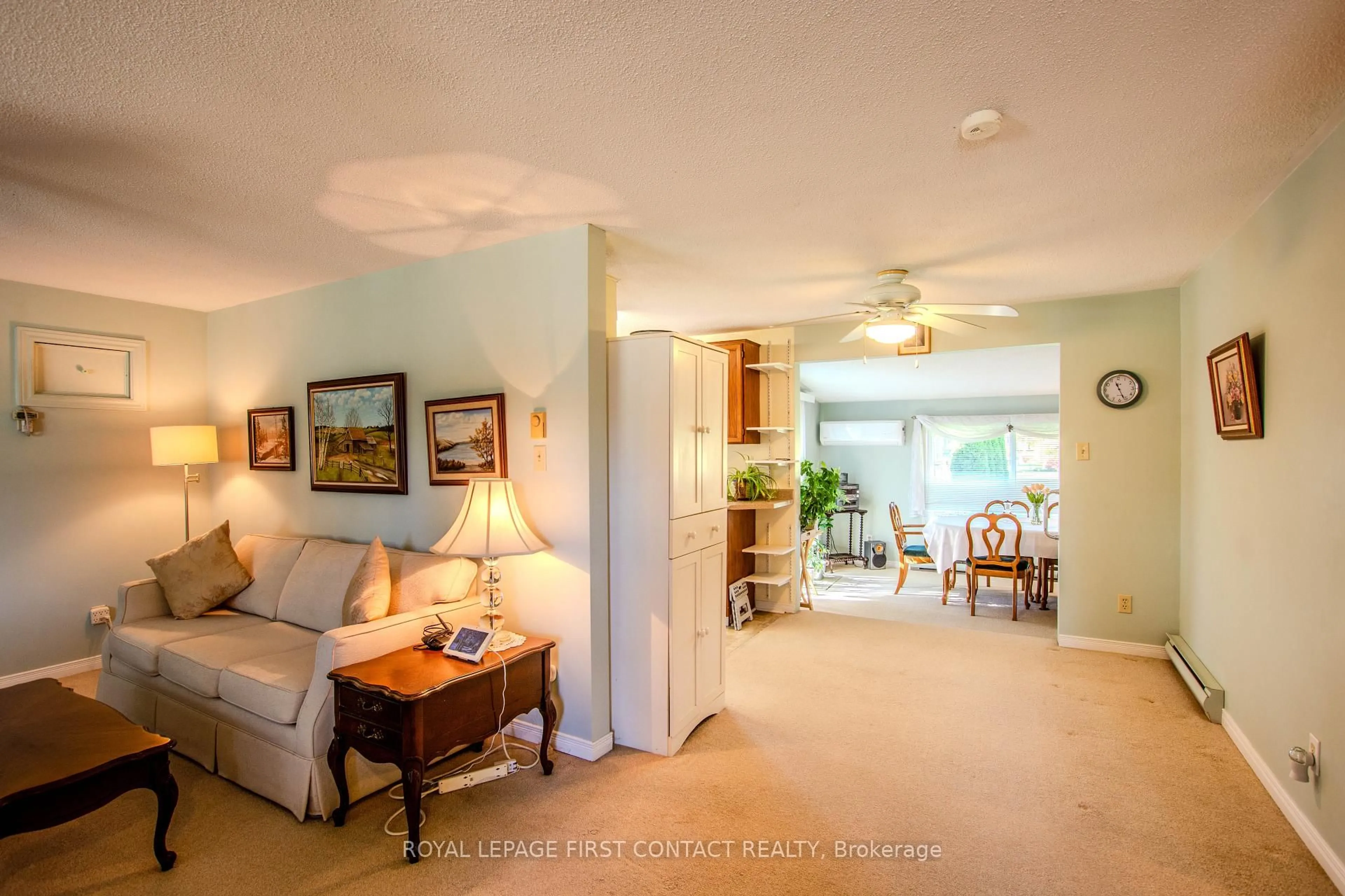 Living room with furniture, ceramic/tile floor for 2 Norris Arm, Innisfil Ontario L9S 1N6