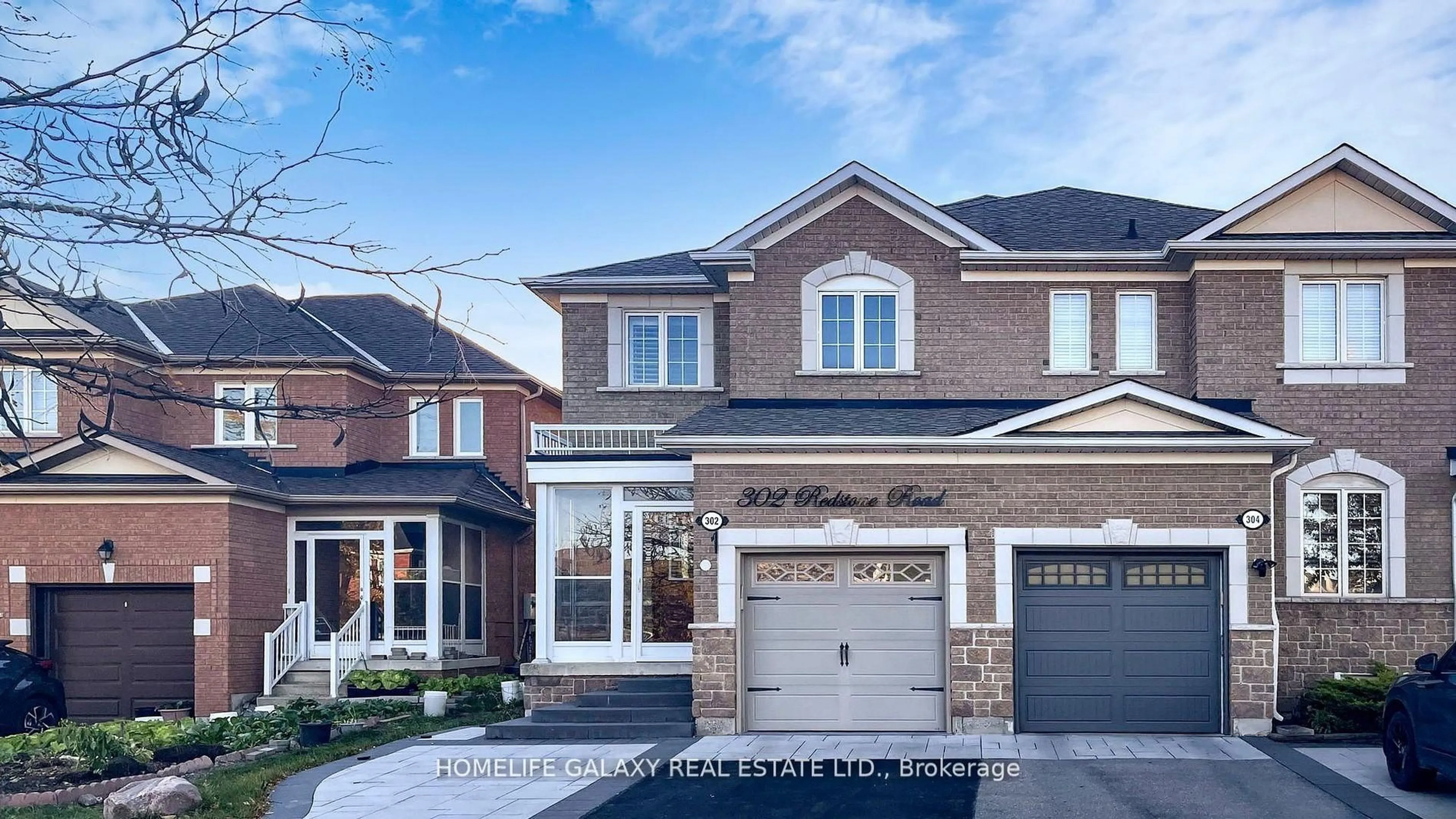 Home with brick exterior material, street for 302 Redstone Rd, Richmond Hill Ontario L4S 2V6