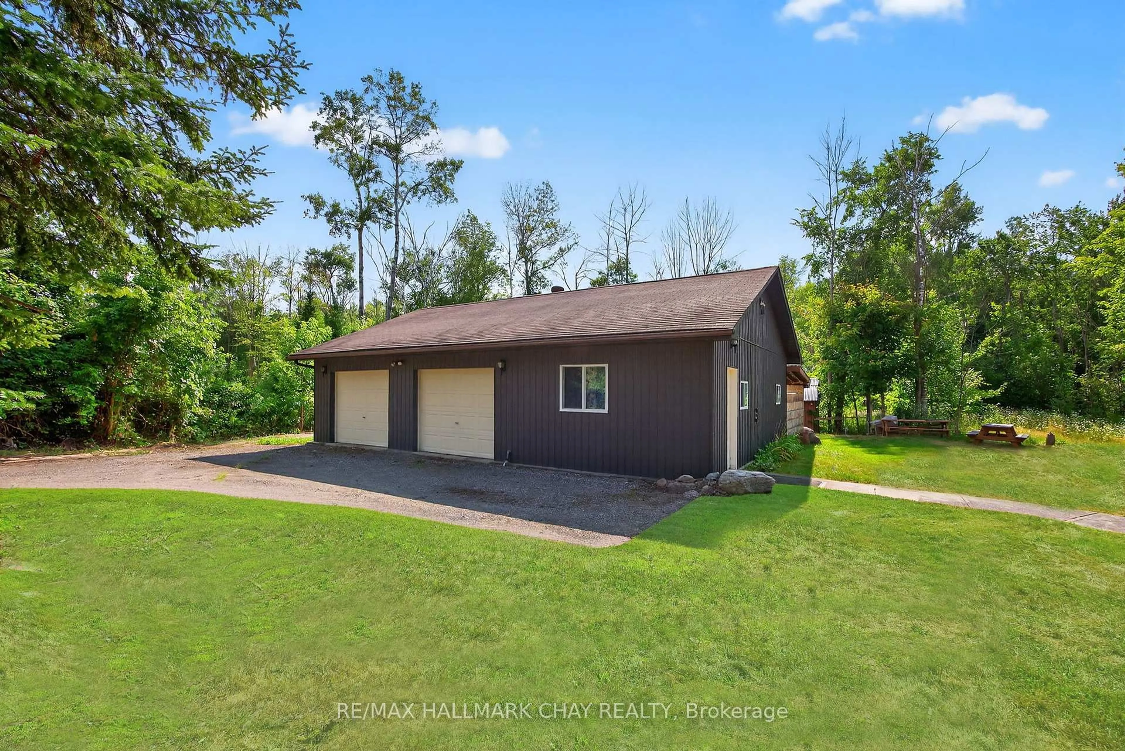 A pic from outside/outdoor area/front of a property/back of a property/a pic from drone, water/lake/river/ocean view for 7950 8th Line, Essa Ontario L0M 1T0