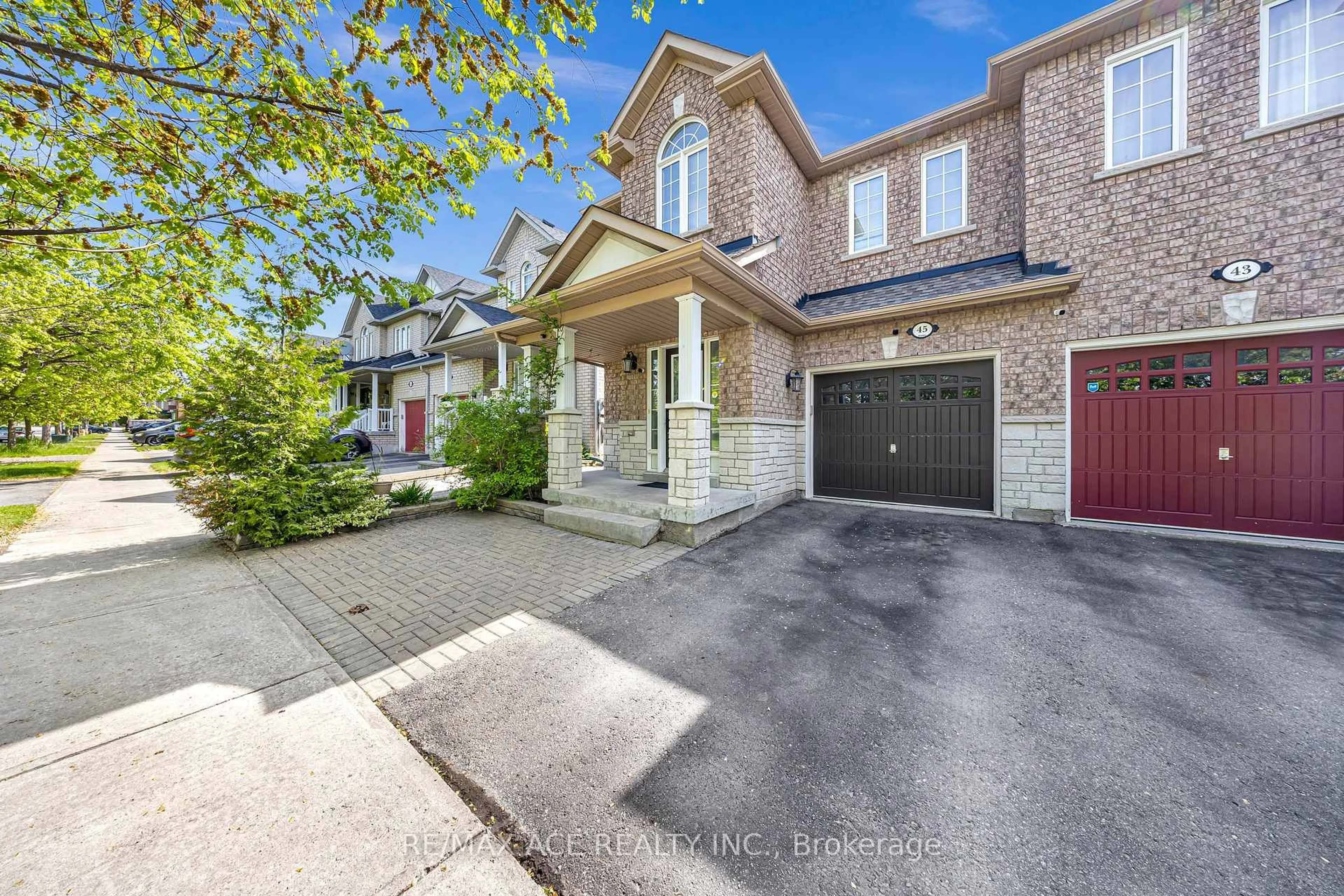 Home with brick exterior material, street for 45 Harry Blaylock Dr, Markham Ontario L6E 2H1