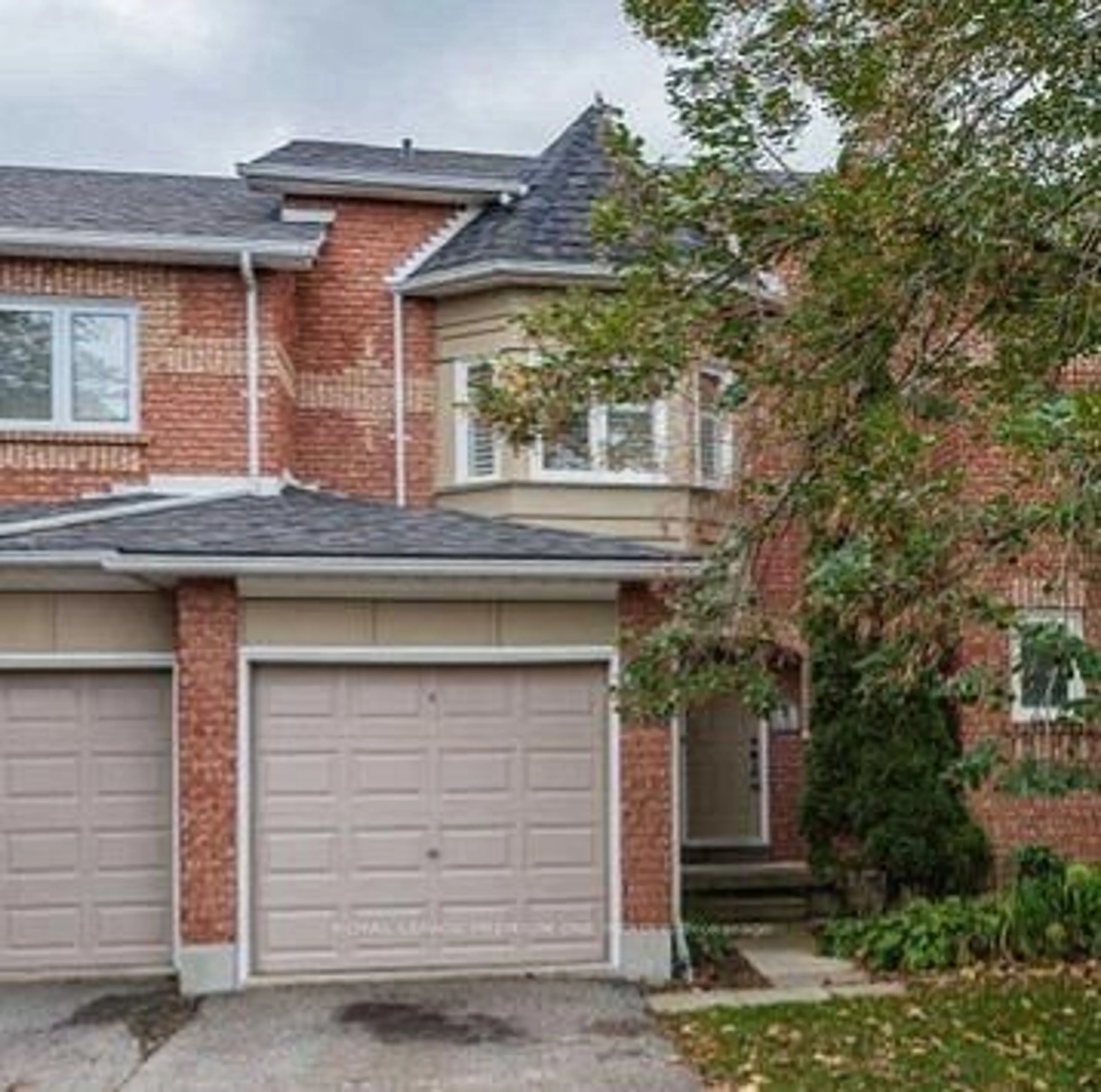 Home with brick exterior material, street for 919 Caribou Valley Circ, Newmarket Ontario L3X 1W9