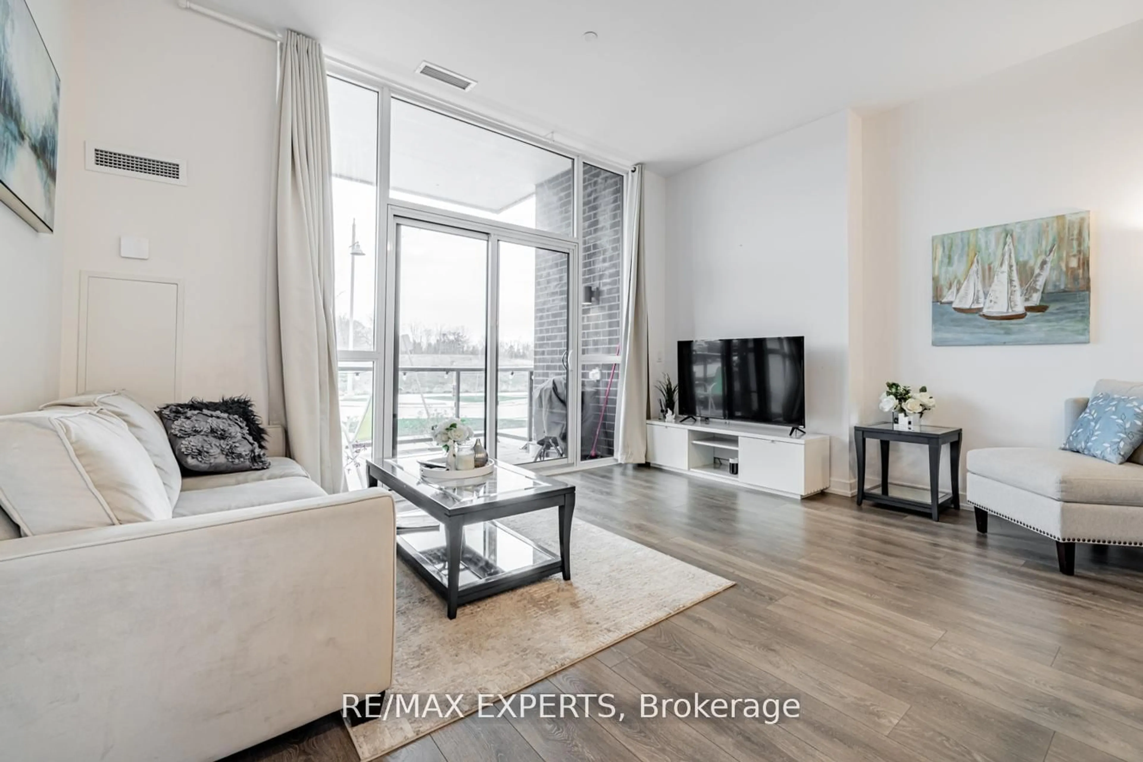 Living room with furniture, unknown for 415 Sea Ray Ave #105, Innisfil Ontario L9S 0R5