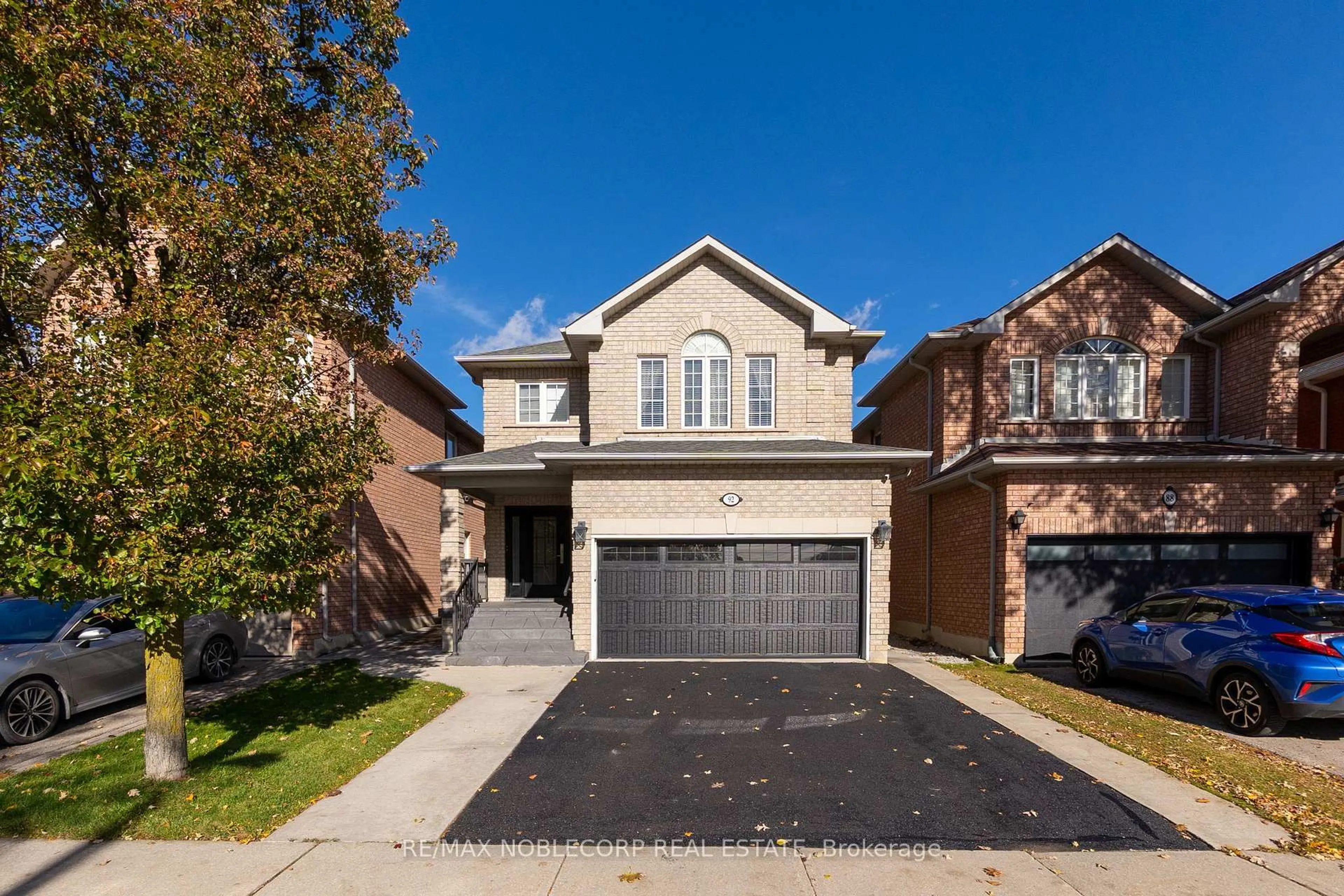 Home with brick exterior material, street for 92 Water Garden Lane, Vaughan Ontario L4H 1N5