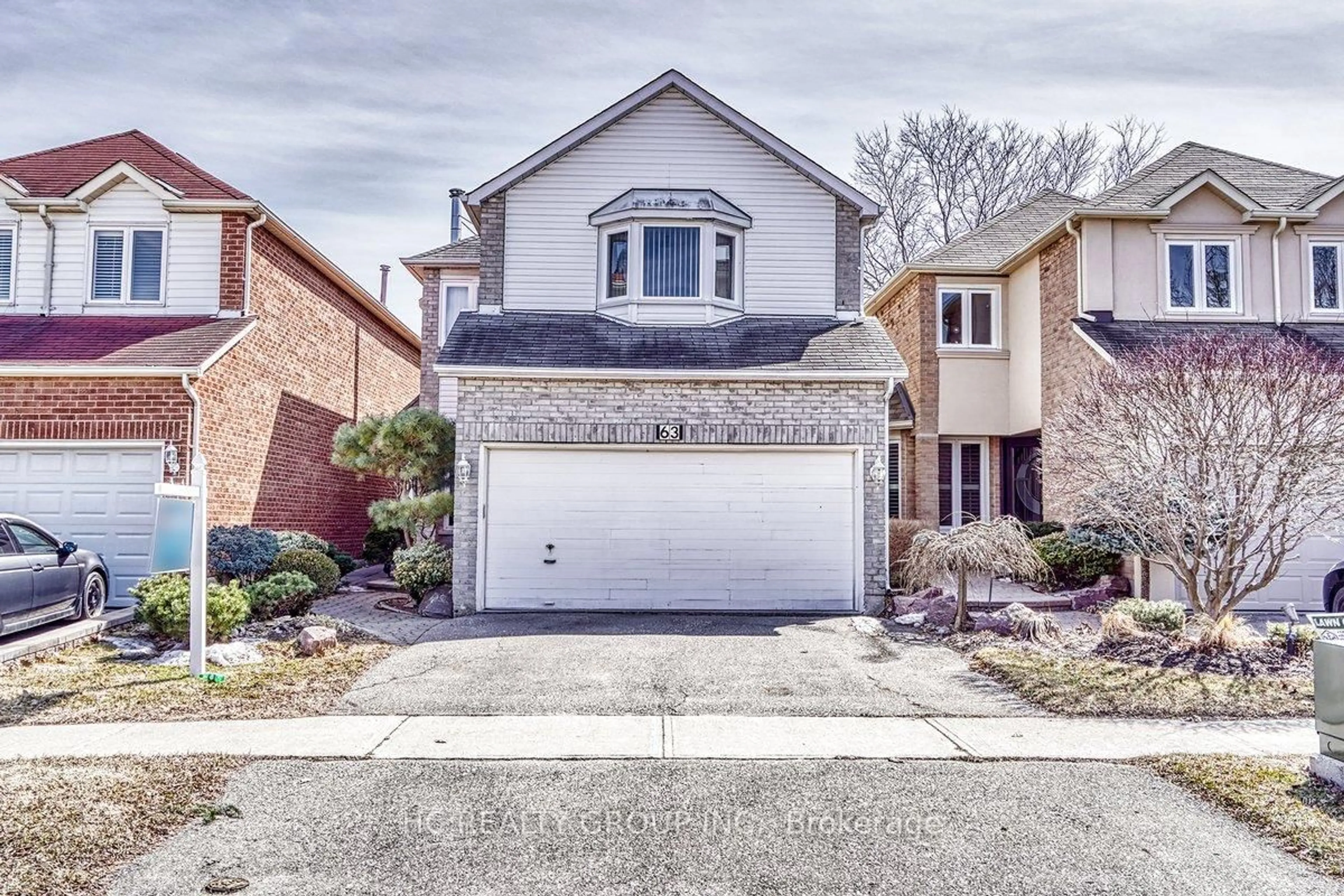 Home with brick exterior material, street for 63 Ramblewood Lane, Vaughan Ontario L4J 6R9