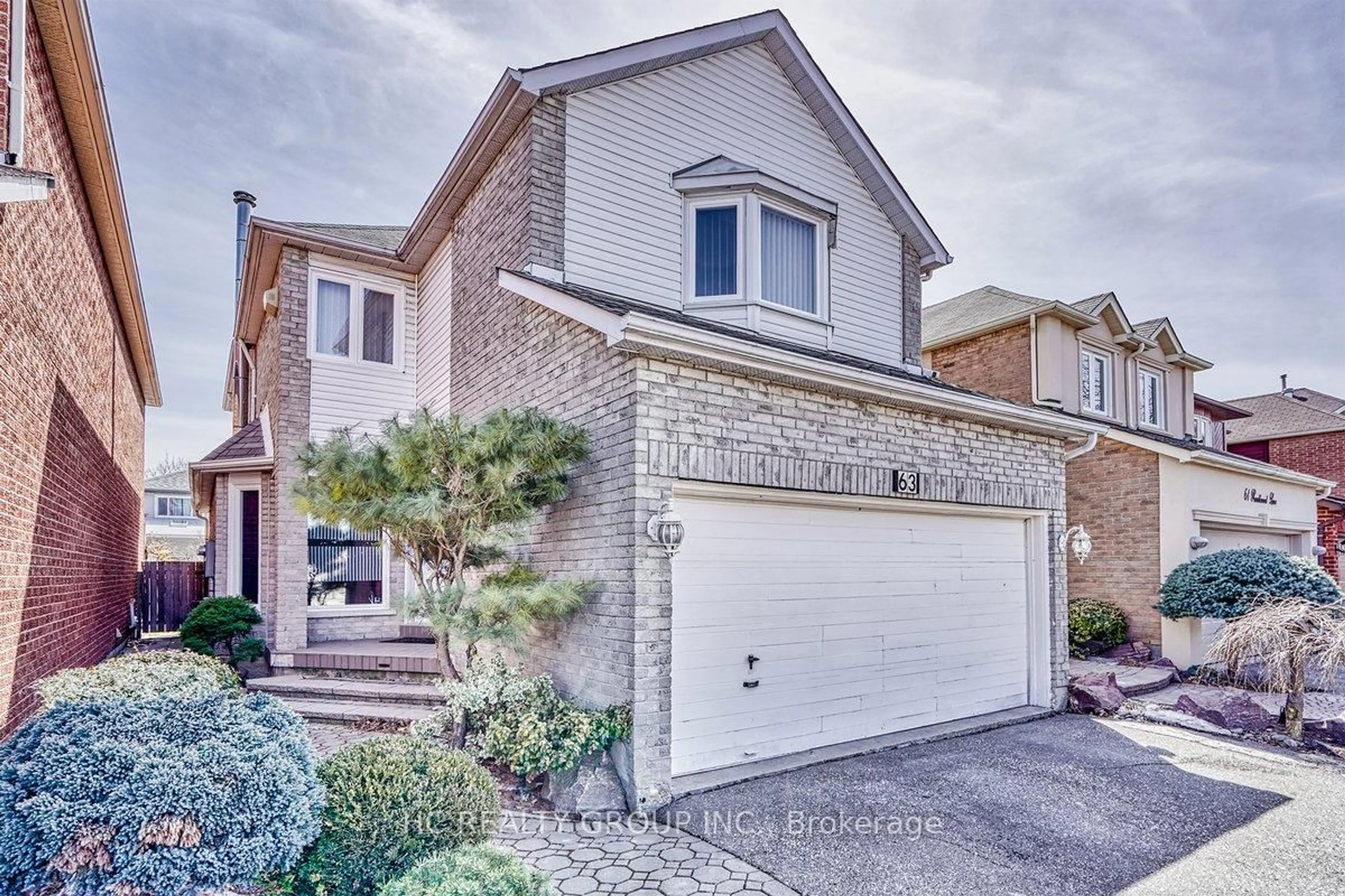 Home with brick exterior material, street for 63 Ramblewood Lane, Vaughan Ontario L4J 6R9