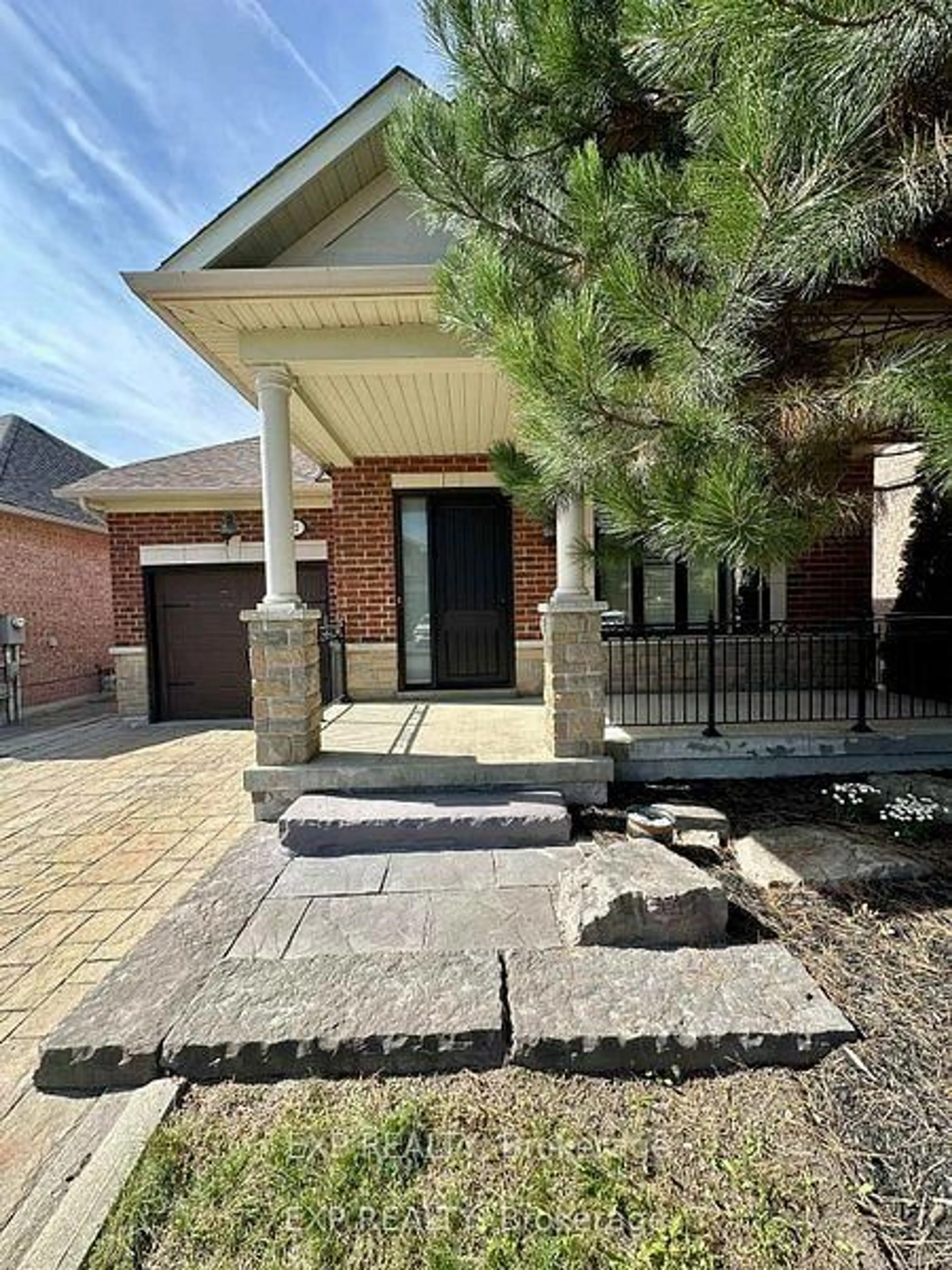 Home with brick exterior material, street for 27 Butterwood Lane, Whitchurch-Stouffville Ontario L4A 0M7