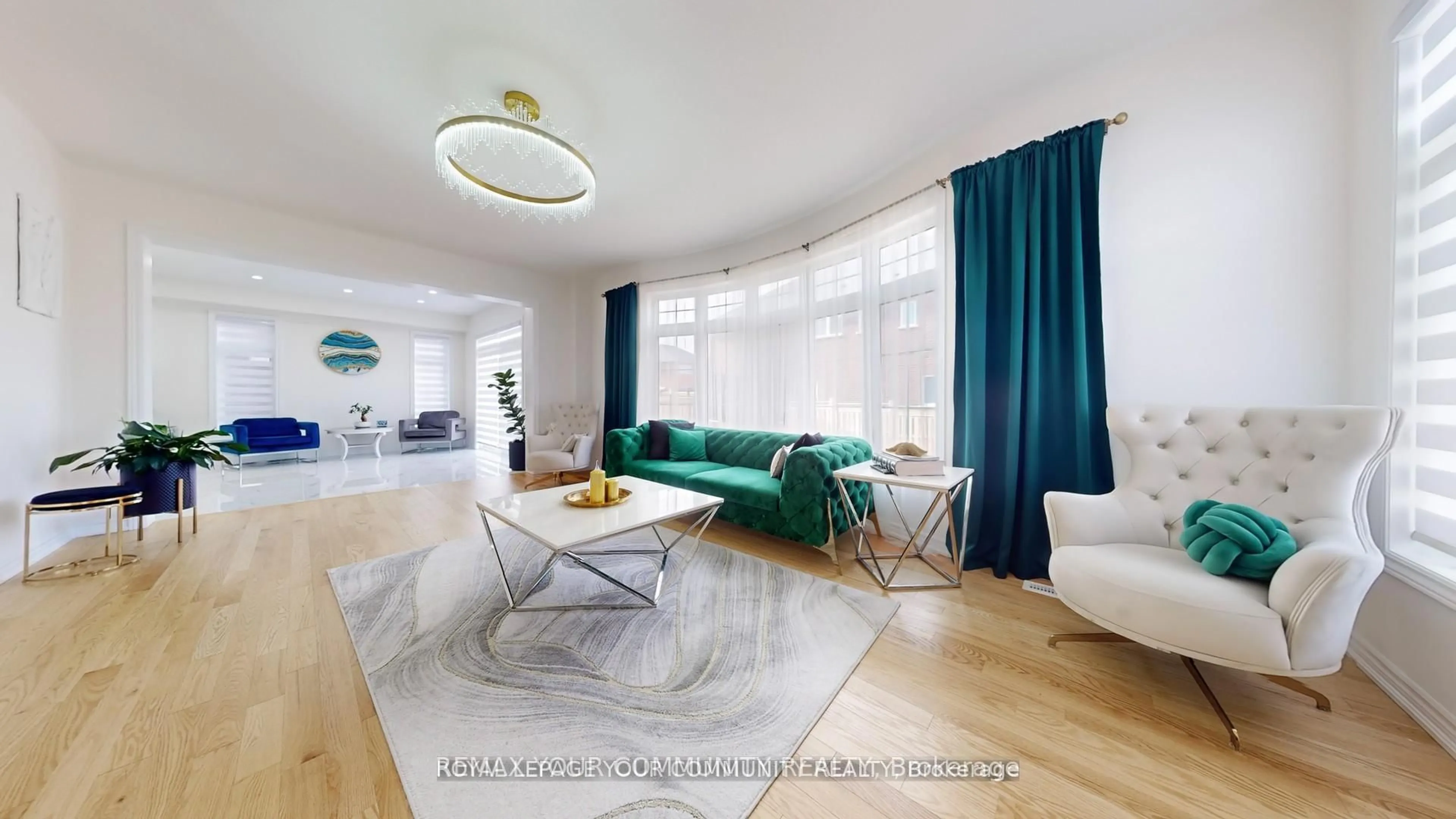 Living room with furniture, wood/laminate floor for 1072 Wickham Rd, Innisfil Ontario L9S 0P8