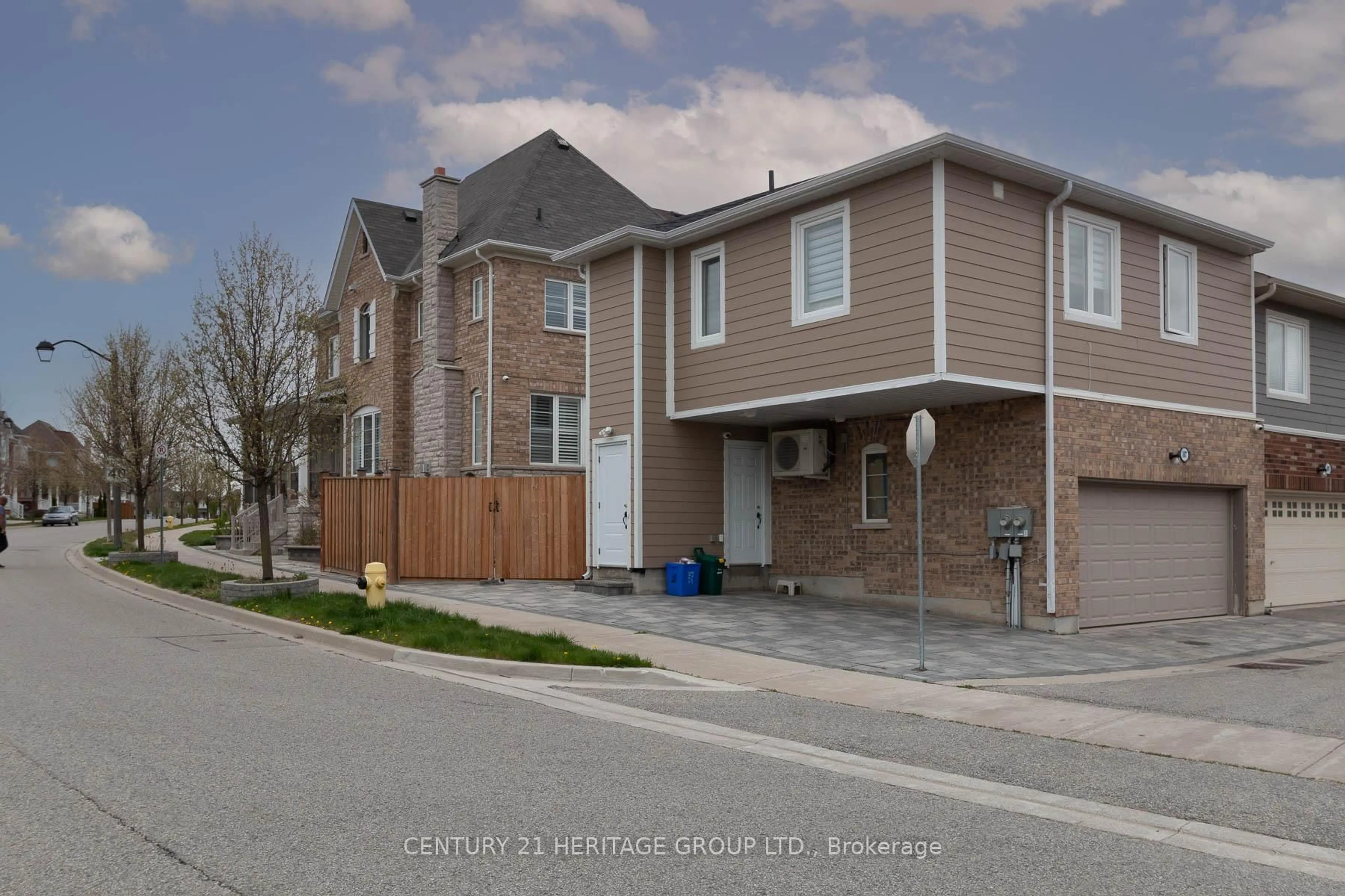 A pic from outside/outdoor area/front of a property/back of a property/a pic from drone, street for 107 Lawrence Pilkington Ave, Markham Ontario L5B 0Y6