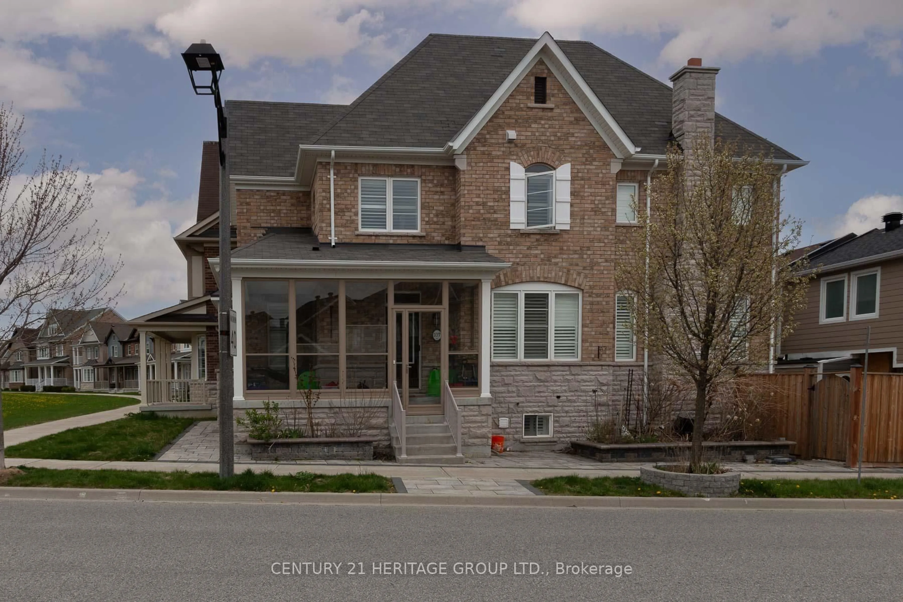 Home with brick exterior material, street for 107 Lawrence Pilkington Ave, Markham Ontario L5B 0Y6