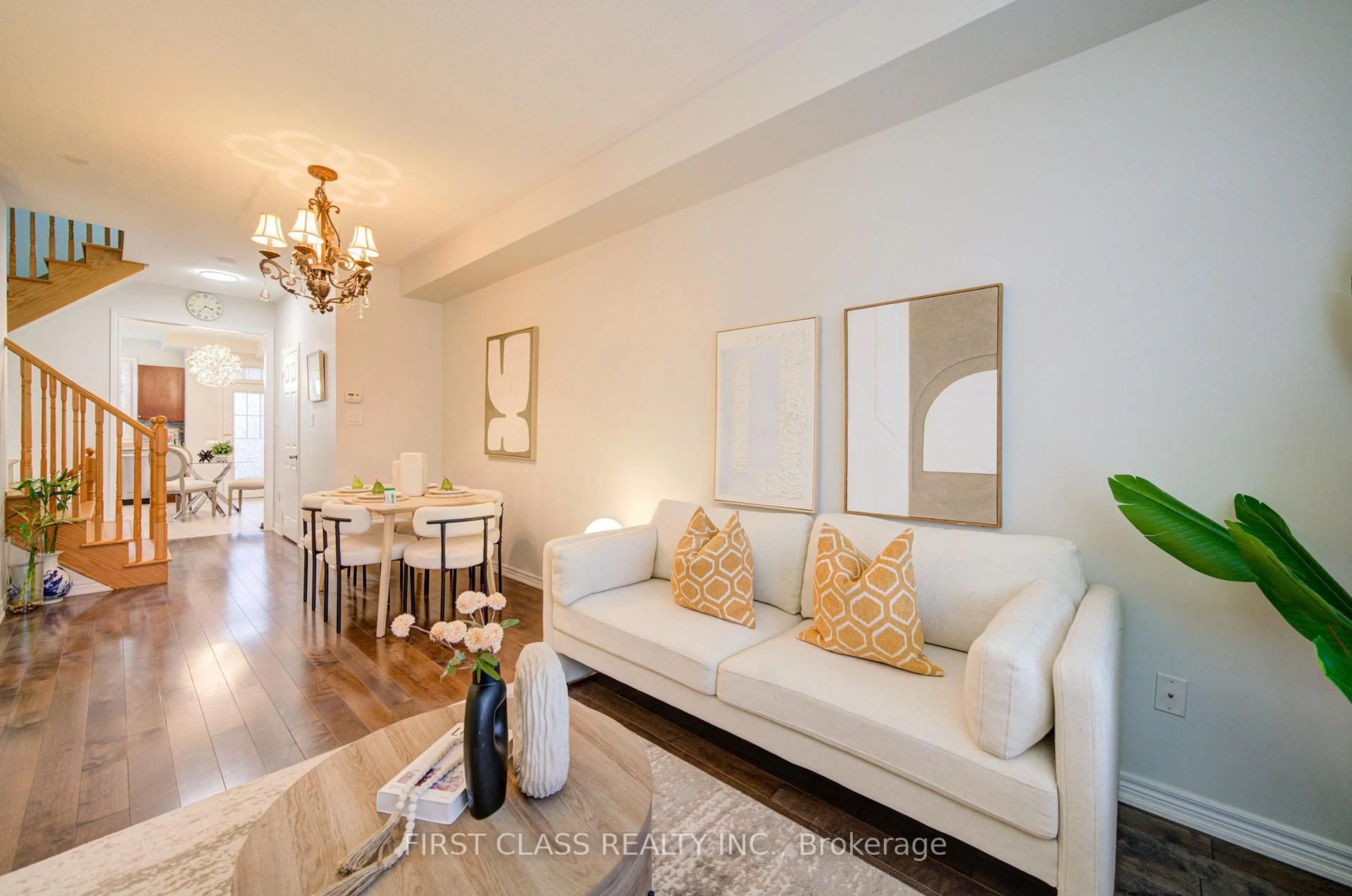 Living room with furniture, wood/laminate floor for 322 Delray Dr, Markham Ontario L6E 0R2