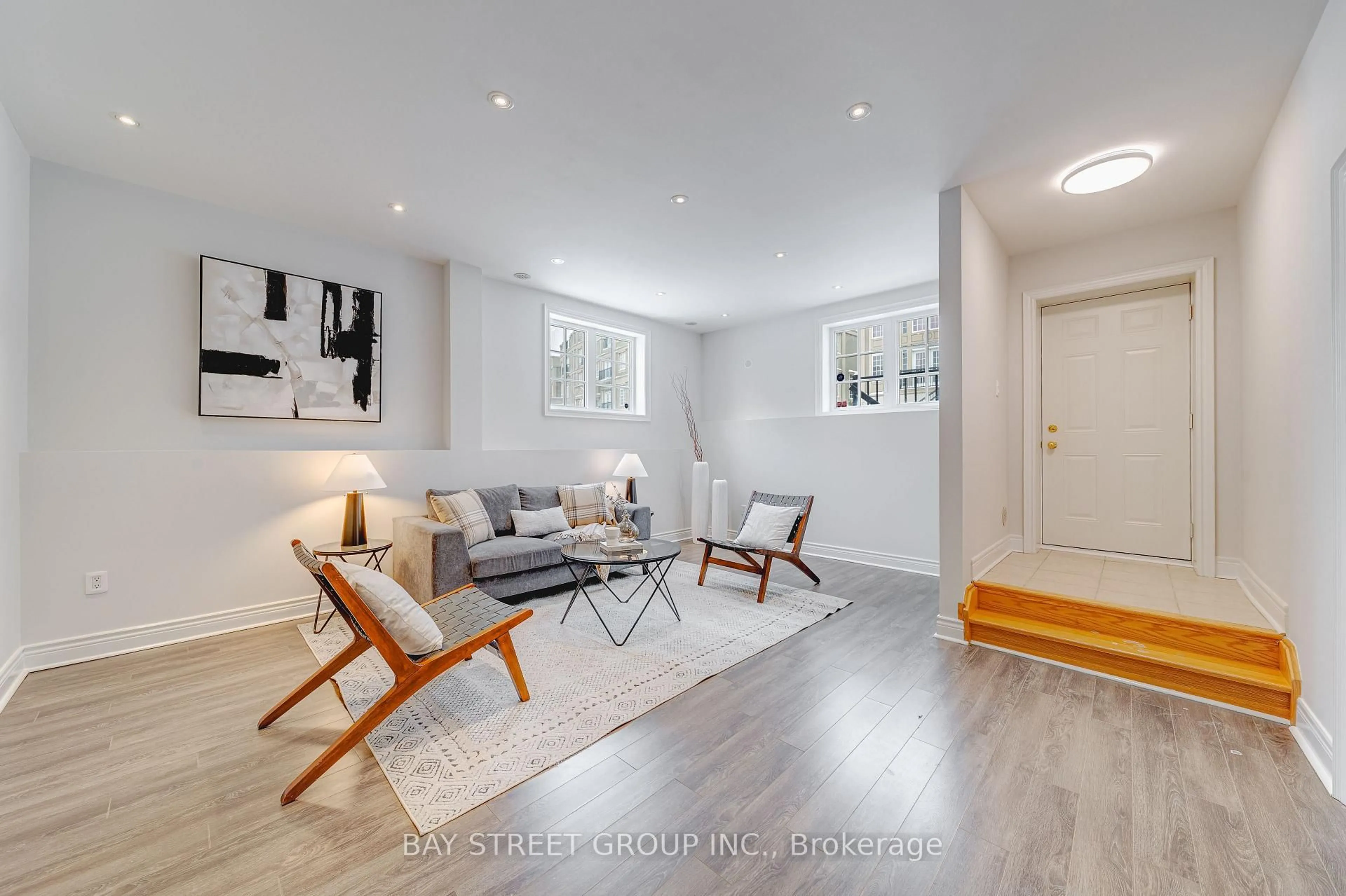 Living room with furniture, wood/laminate floor for 14 Lord Durham Rd, Markham Ontario L6G 0C1