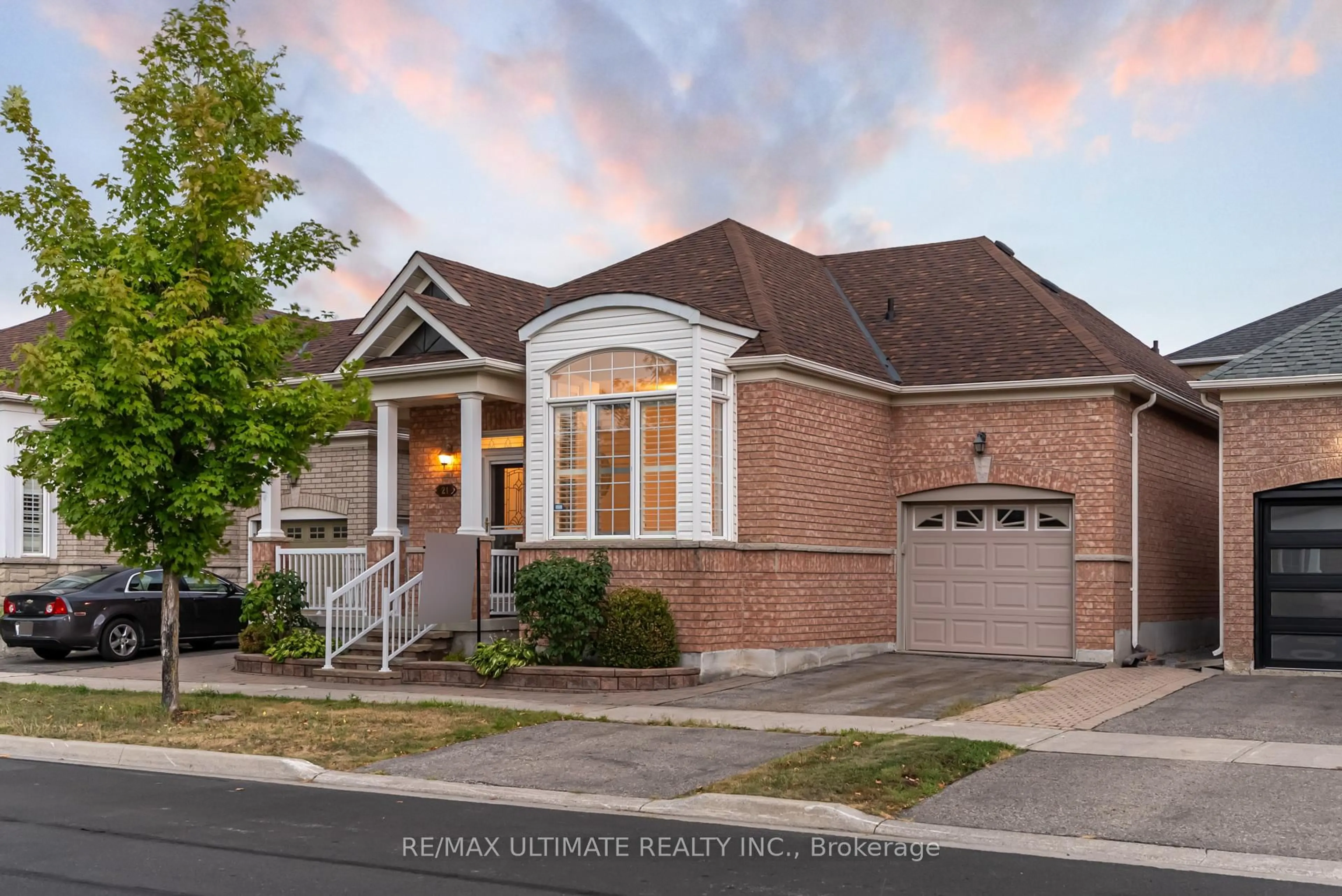 Home with brick exterior material, street for 21 Delray Dr, Markham Ontario L6E 1L9