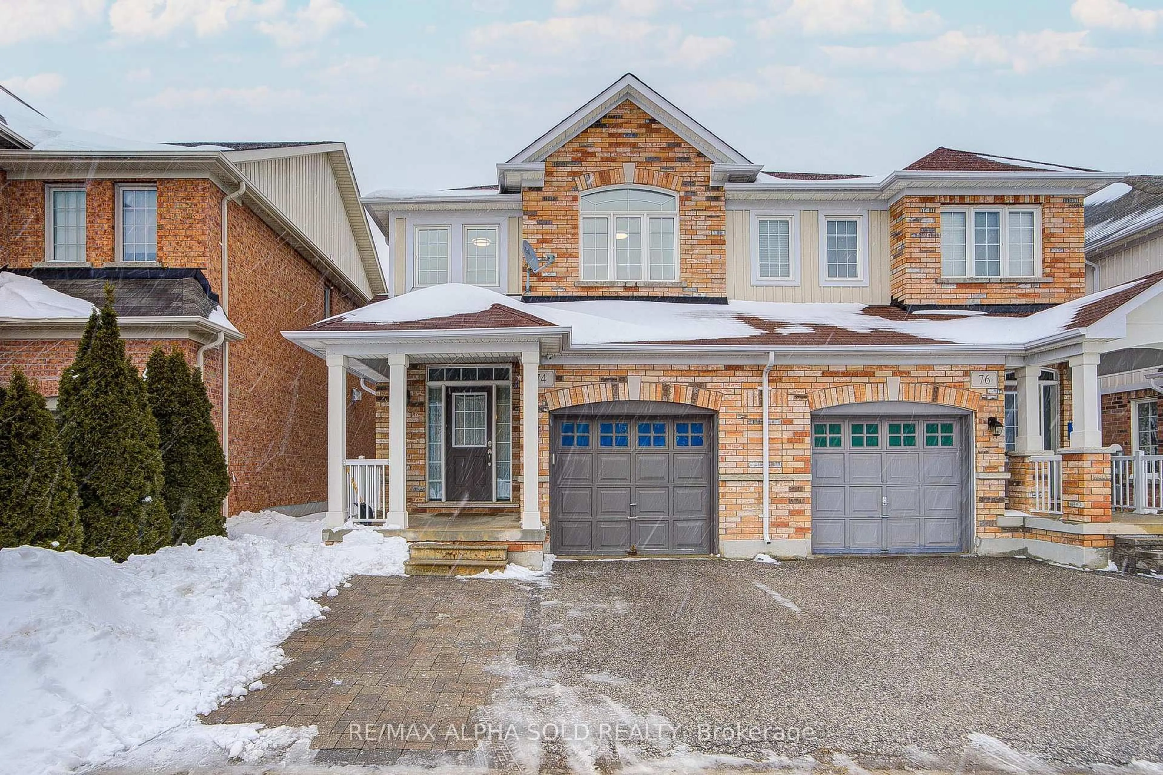 Home with brick exterior material, street for 74 Evershot Cres, Markham Ontario L6E 0L7