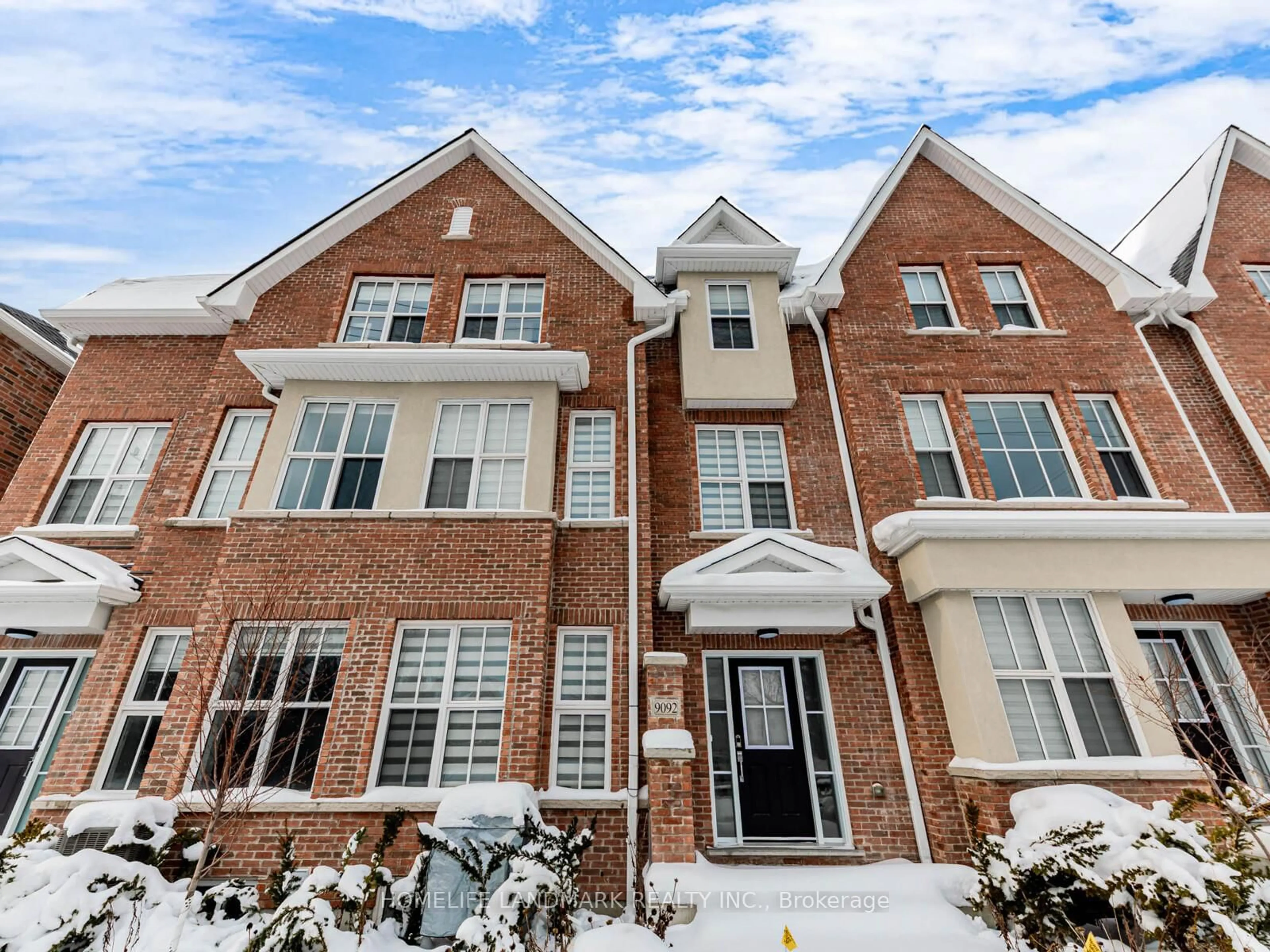 Home with brick exterior material, street for 9092 Woodbine Ave, Markham Ontario L3R 9W3