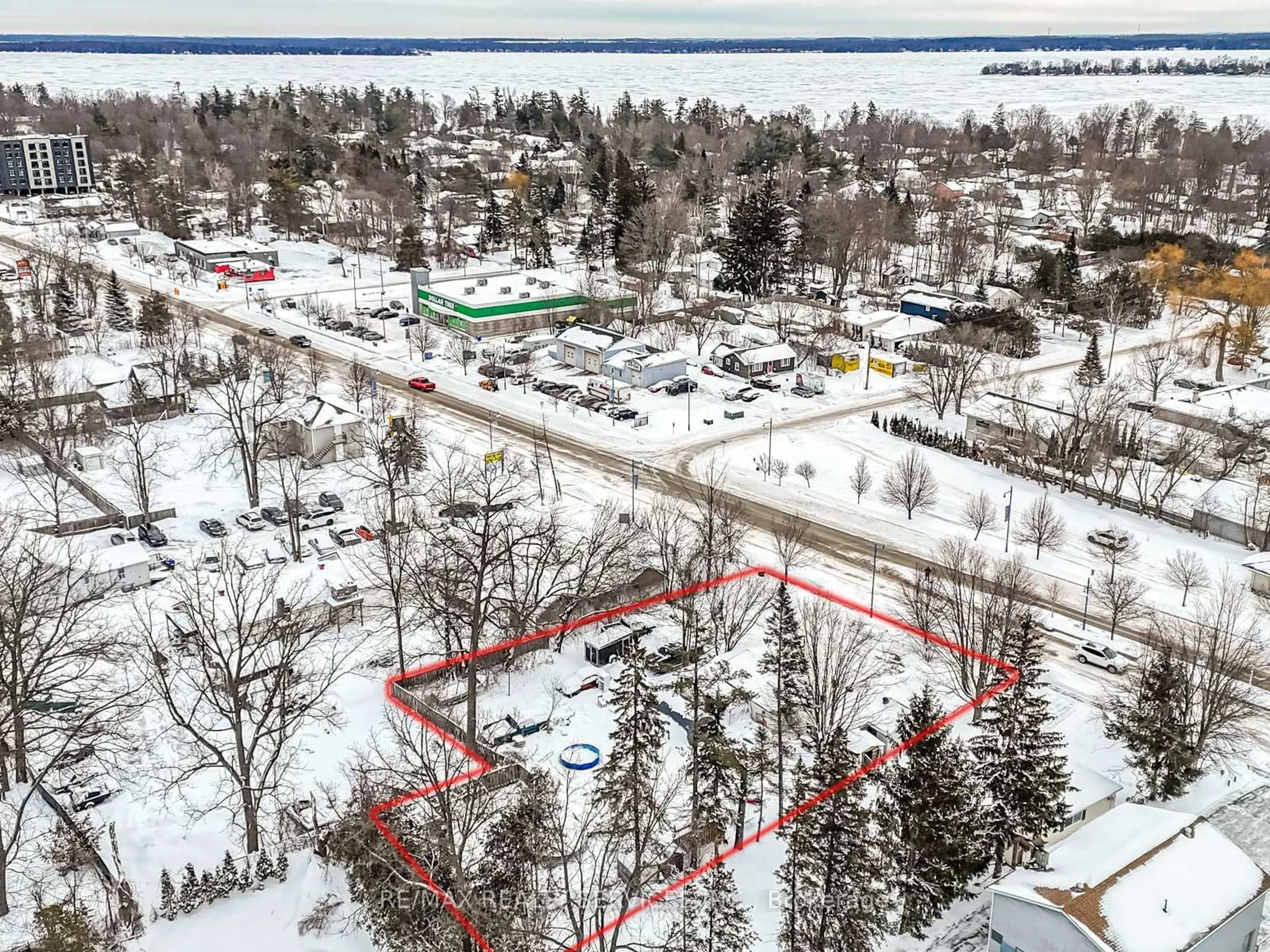 A pic from outside/outdoor area/front of a property/back of a property/a pic from drone, water/lake/river/ocean view for 908 Innisfil Beach Rd, Innisfil Ontario L9S 2C2