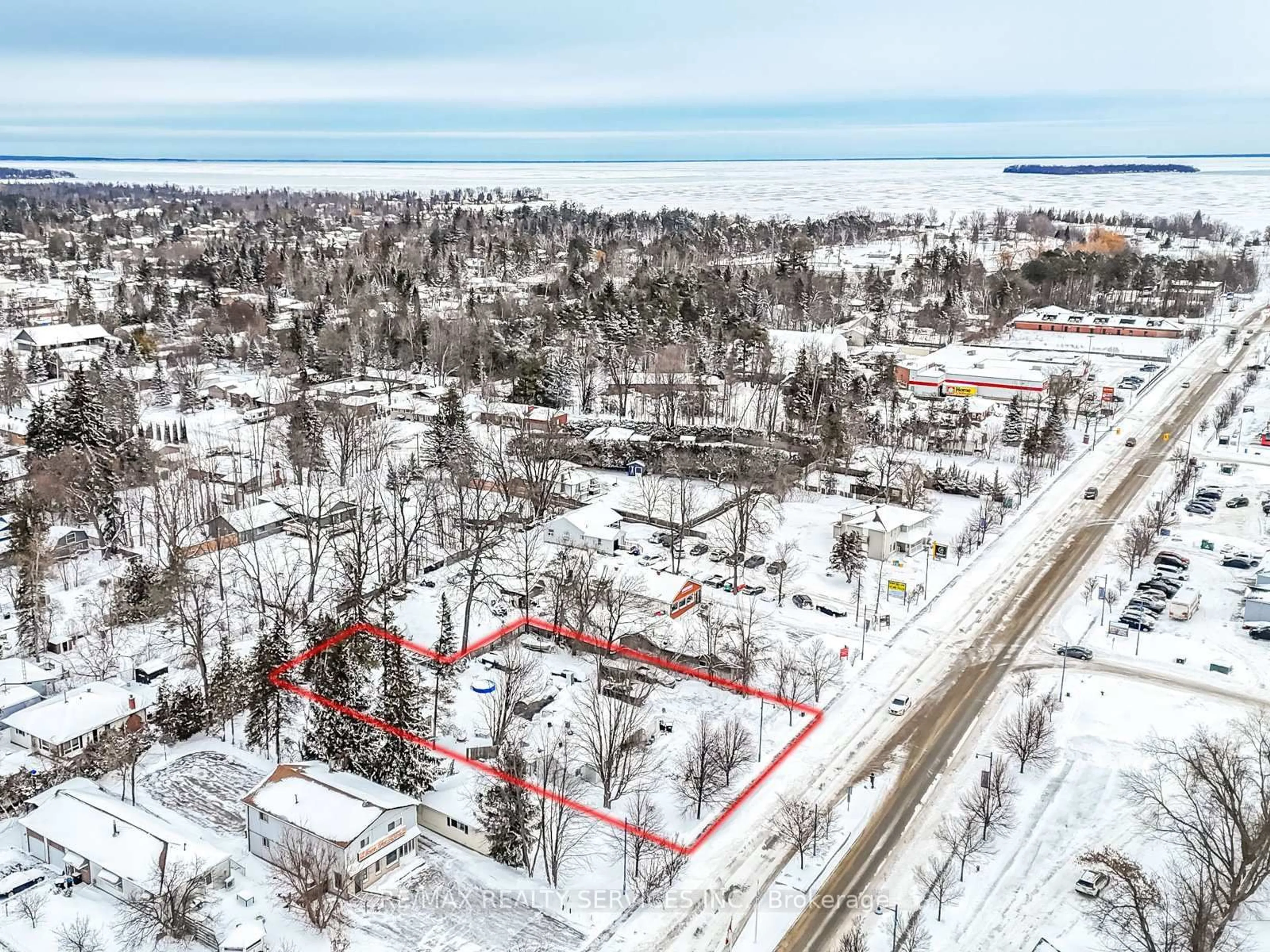 A pic from outside/outdoor area/front of a property/back of a property/a pic from drone, street for 908 Innisfil Beach Rd, Innisfil Ontario L9S 2C2