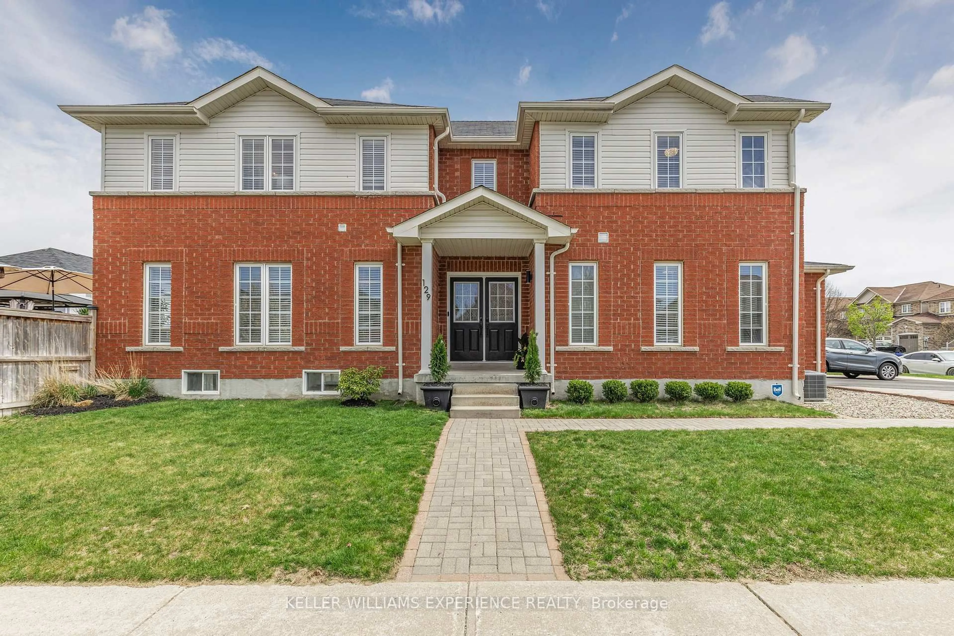 Home with brick exterior material, street for 129 Stonemount Cres, Essa Ontario L0M 1B4