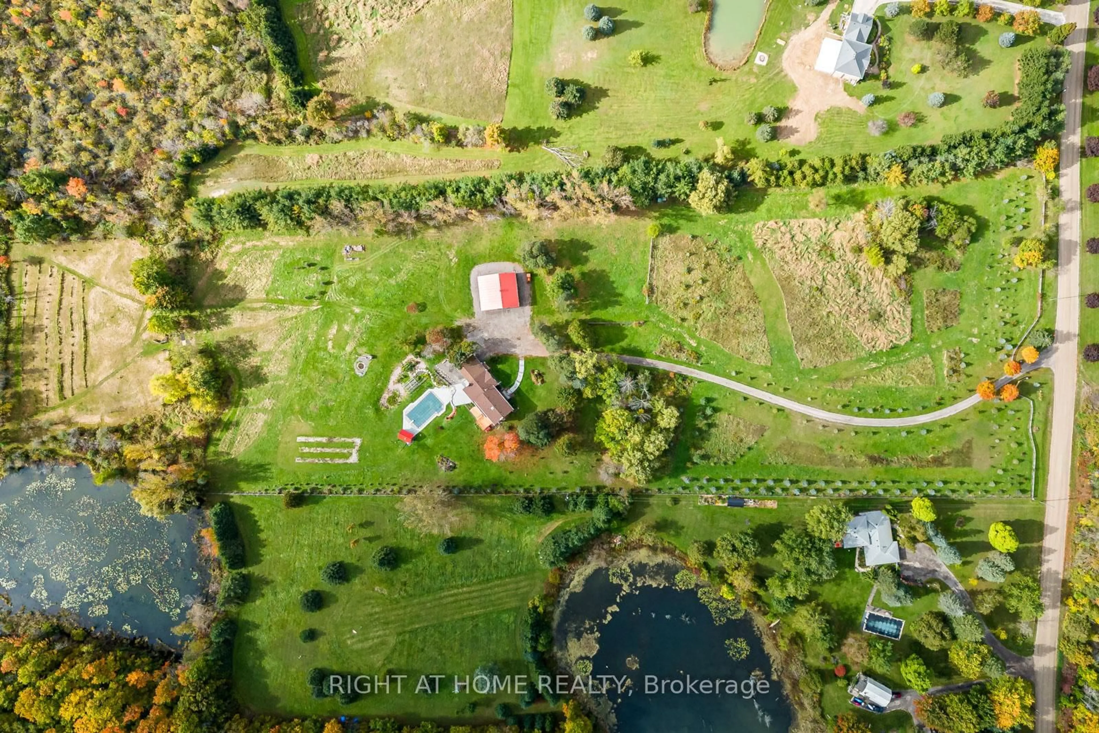A pic from outside/outdoor area/front of a property/back of a property/a pic from drone, unknown for 7975 18th Sdrd, King Ontario L0G 1T0