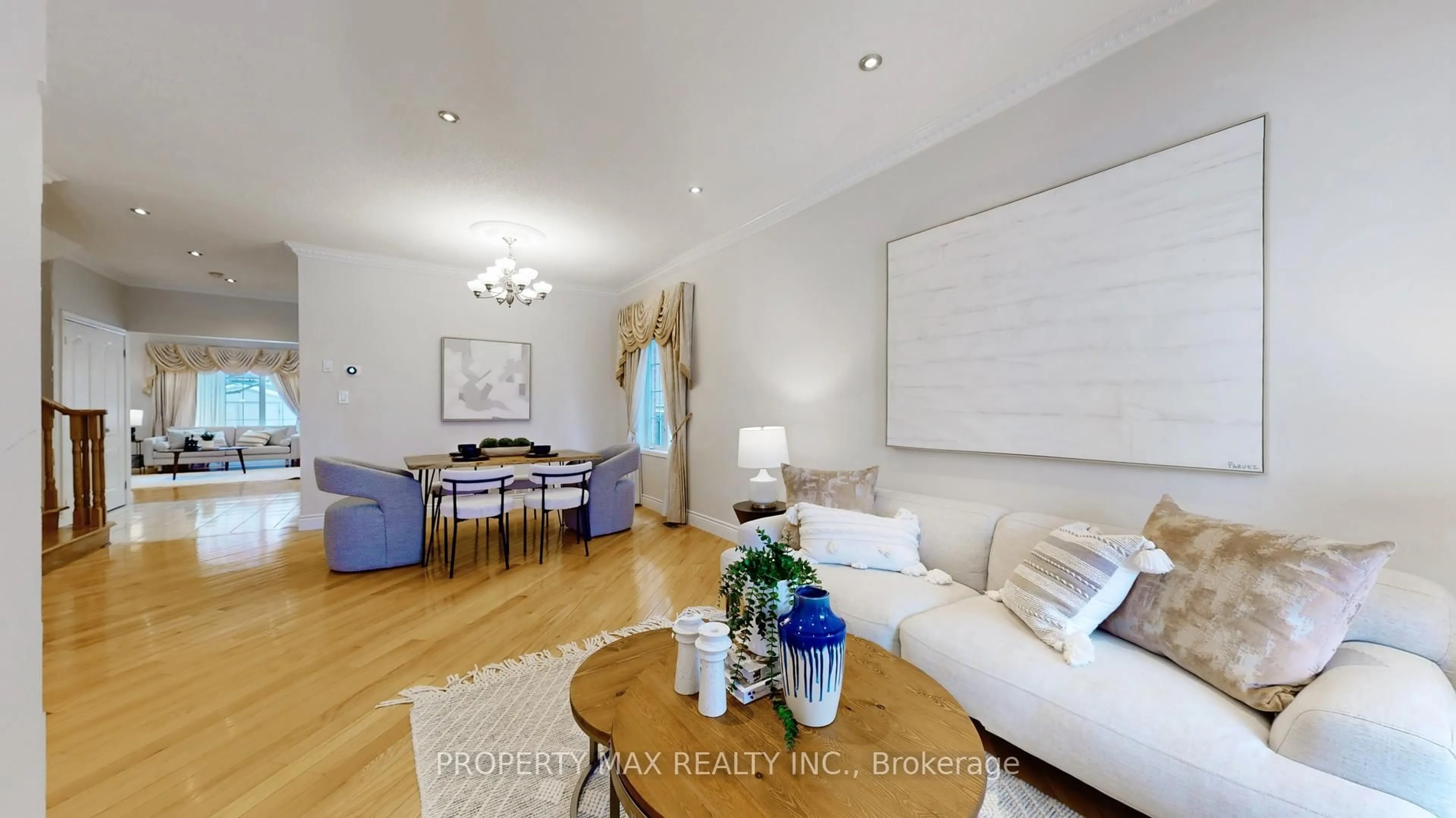 Living room with furniture, wood/laminate floor for 48 Elmrill Rd, Markham Ontario L6C 2P1