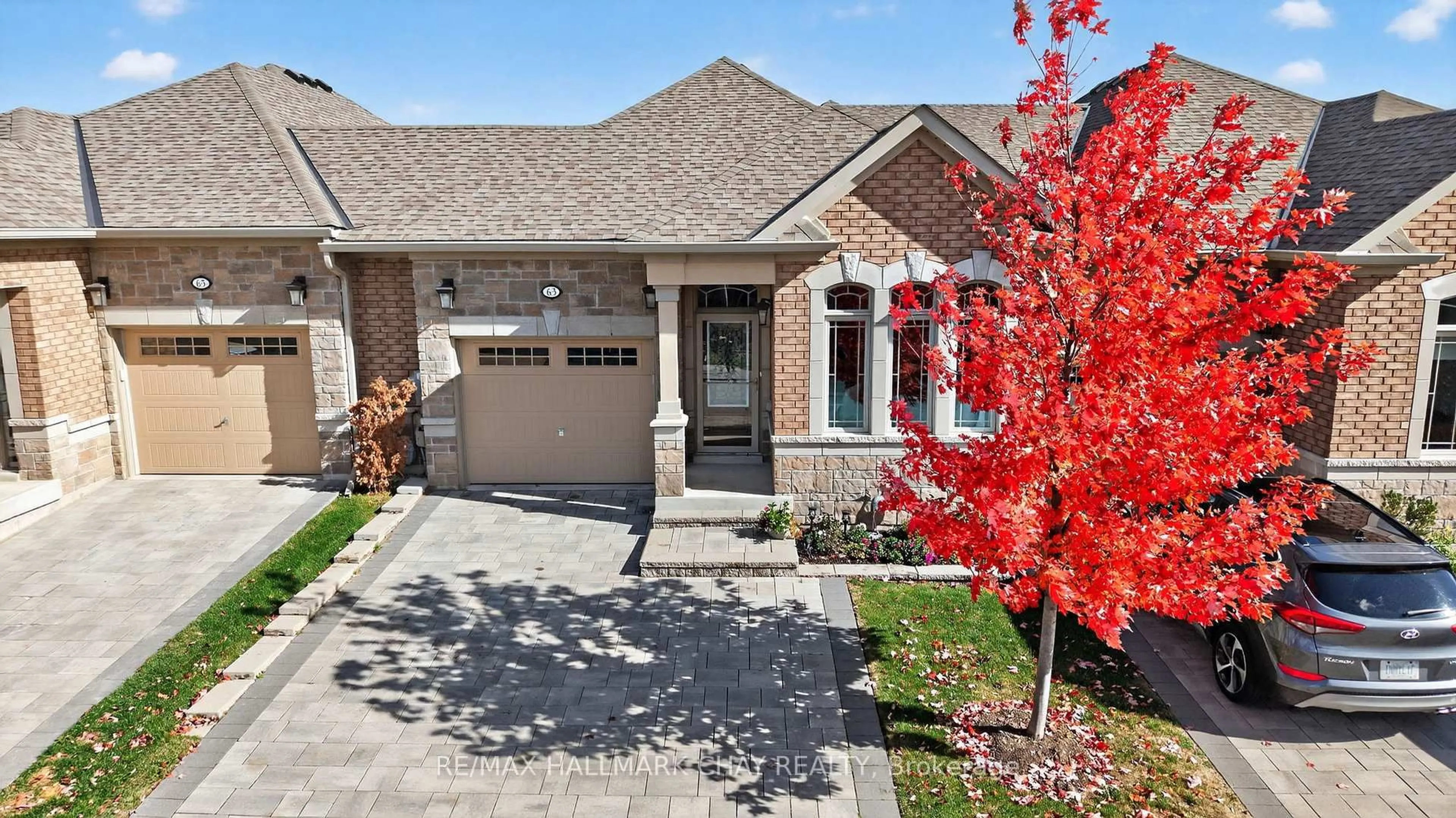 Home with brick exterior material, street for 63 Summerhill Dr, New Tecumseth Ontario L9R 0S8
