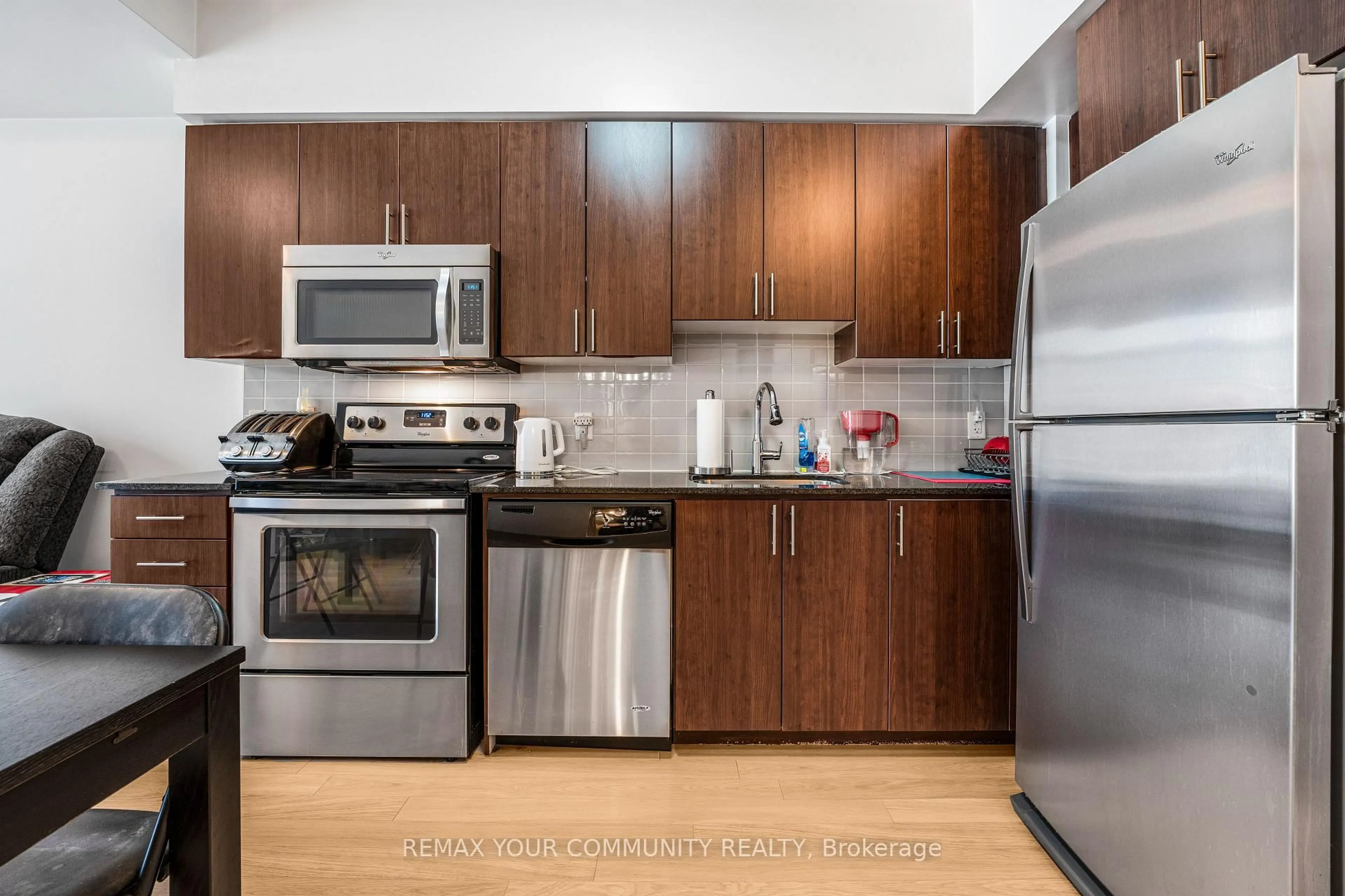 Standard kitchen, wood/laminate floor for 75 North Park Rd #108, Vaughan Ontario L4J 0H8